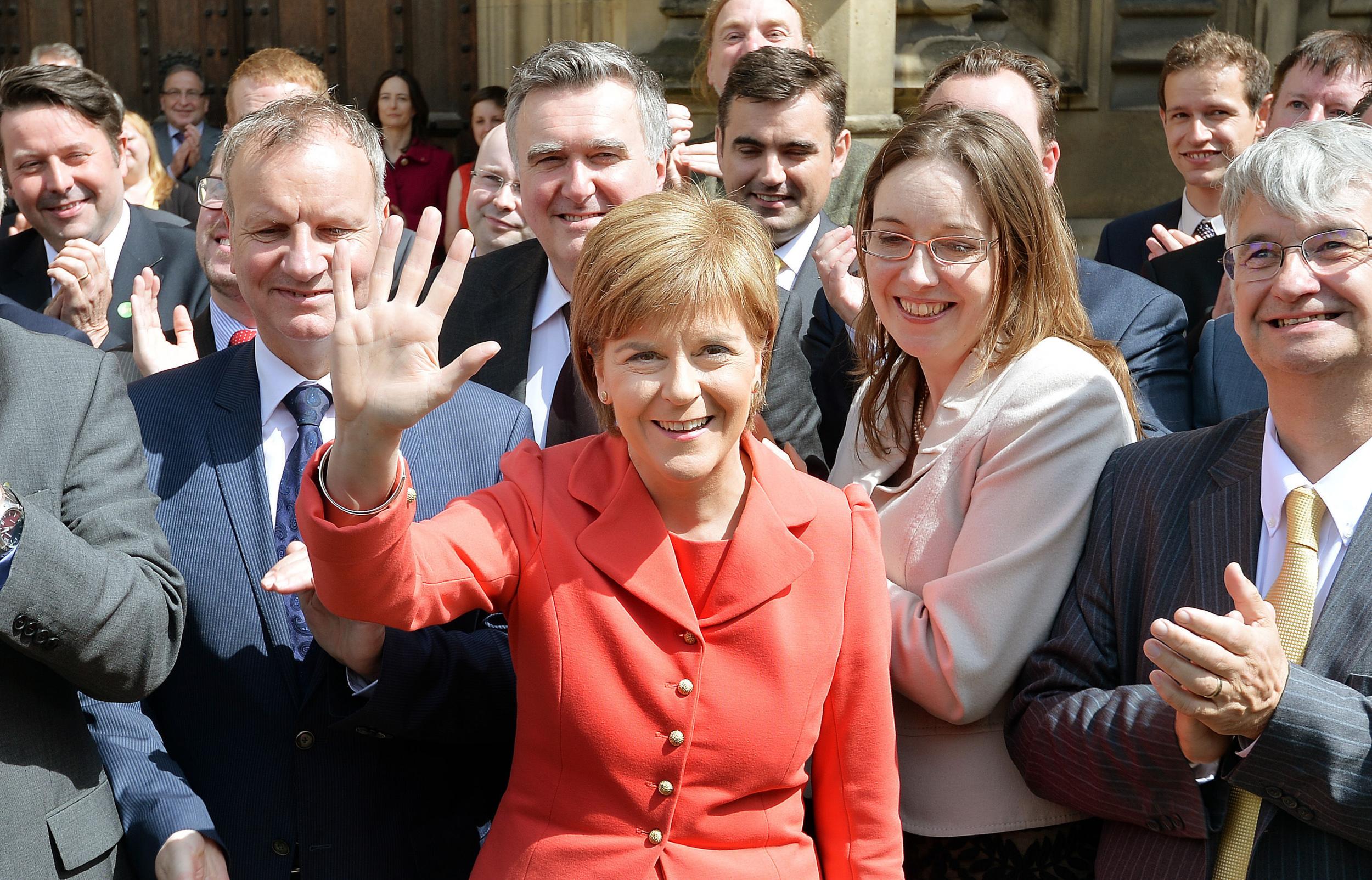 SNP leader Nicola Sturgeon shows off her 56 MPs following the party's election triumph