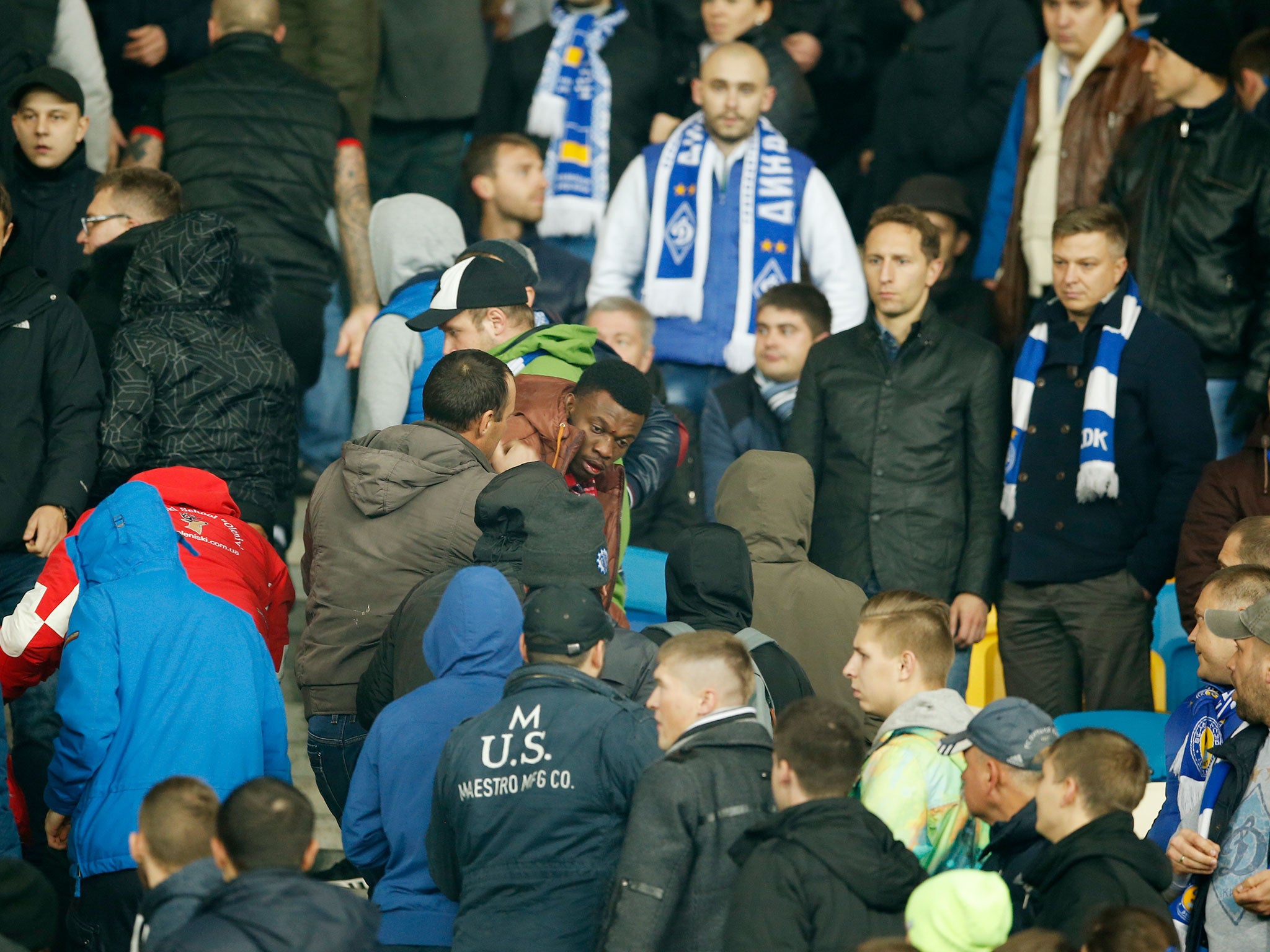 Apparent Dynamo Kiev fans attack four black supporters during the match against Chelsea