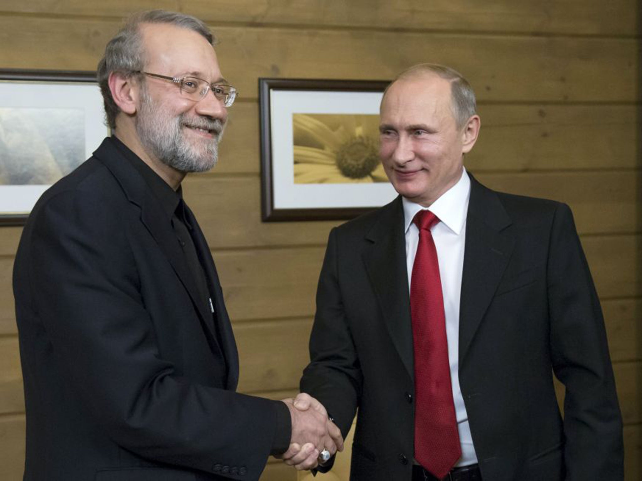 Vladimir Putin met with Iran's parliament speaker Ali Larijani after a session of the Valdai International Discussion Club in Sochi