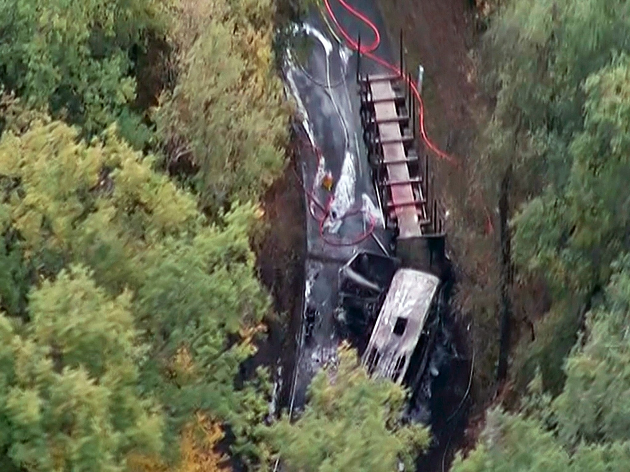 An aerial view of the site where a coach carrying members of an elderly people's club collided with a truck outside Puisseguin near Bordeaux