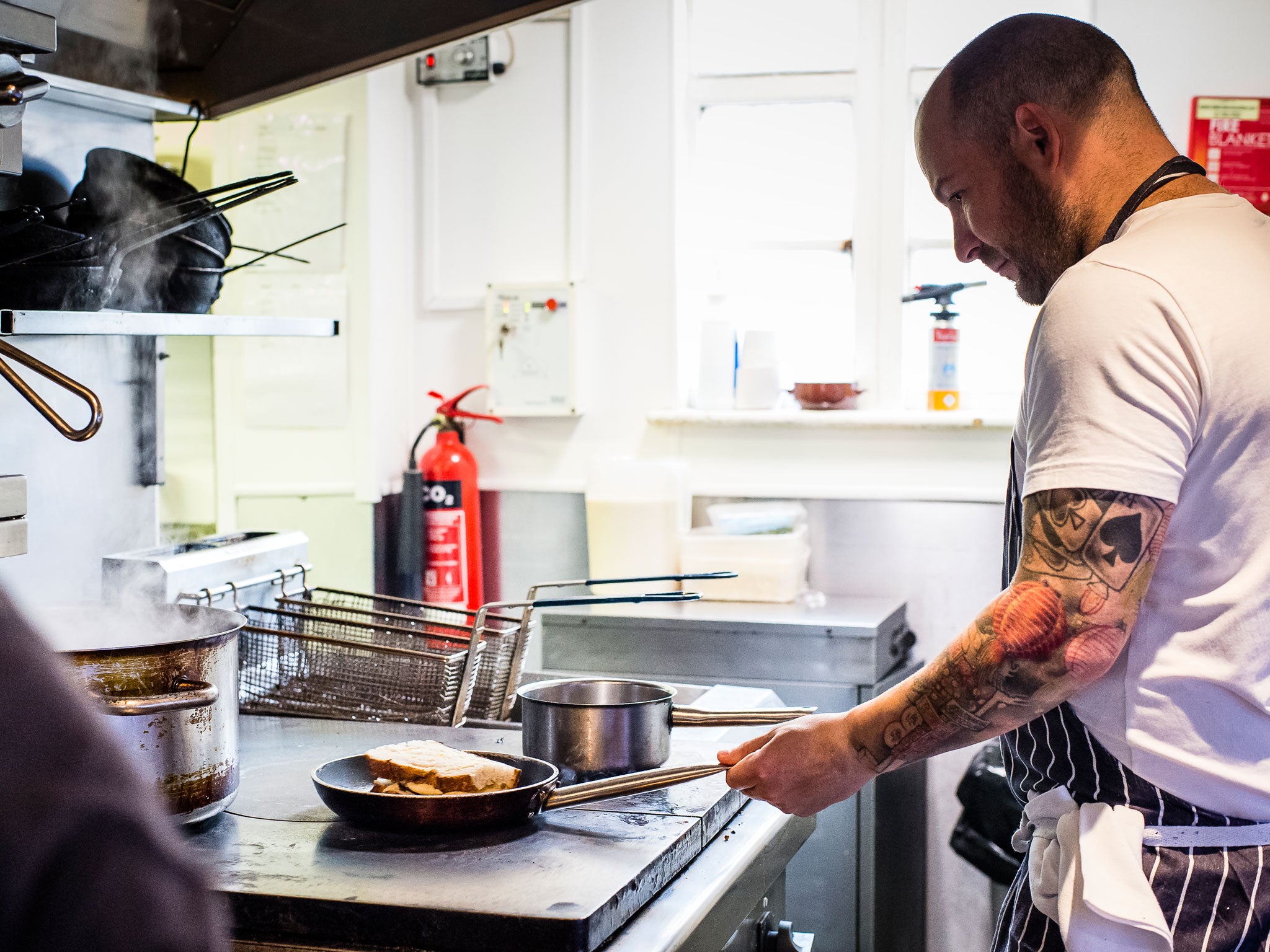 Rankin cooks his grilled beer cheese sandwich