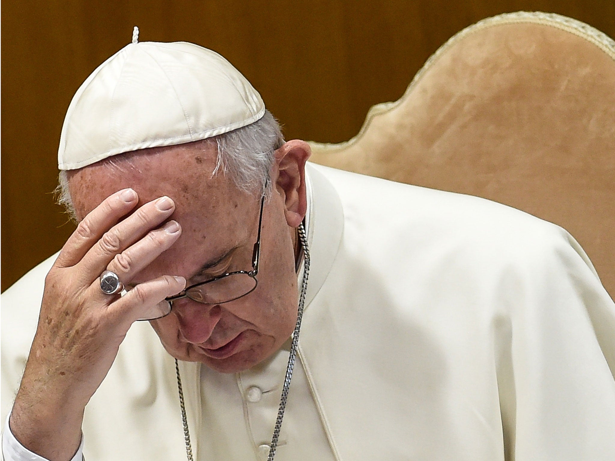 Pope Francis looks on during a morning session of the last day of the Synod on the Family at the Vatican on October 24, 2015