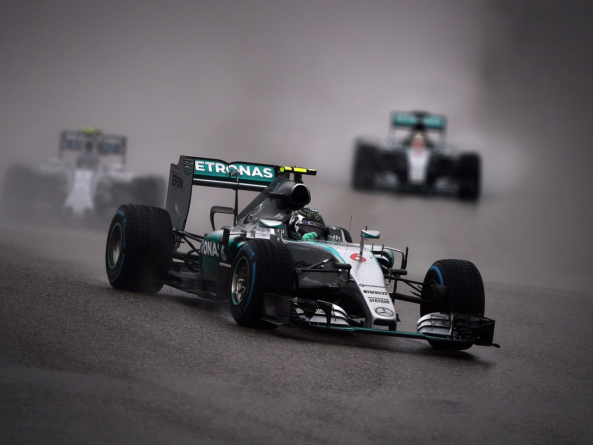 Nico Rosberg of Germany races on the main straight during the delayed qualifying session of the United States Formula One Grand Prix