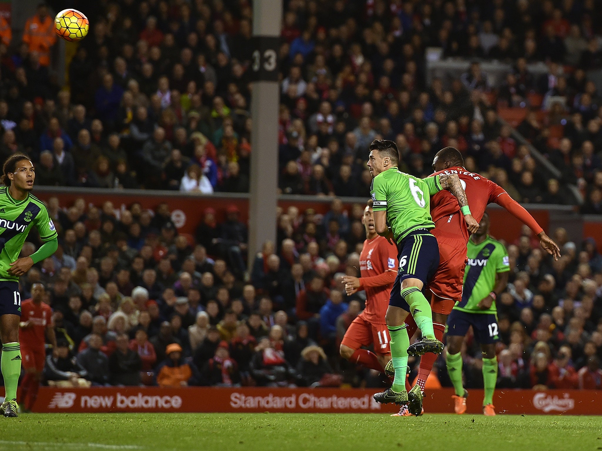 Christian Benteke heads Liverpool in front