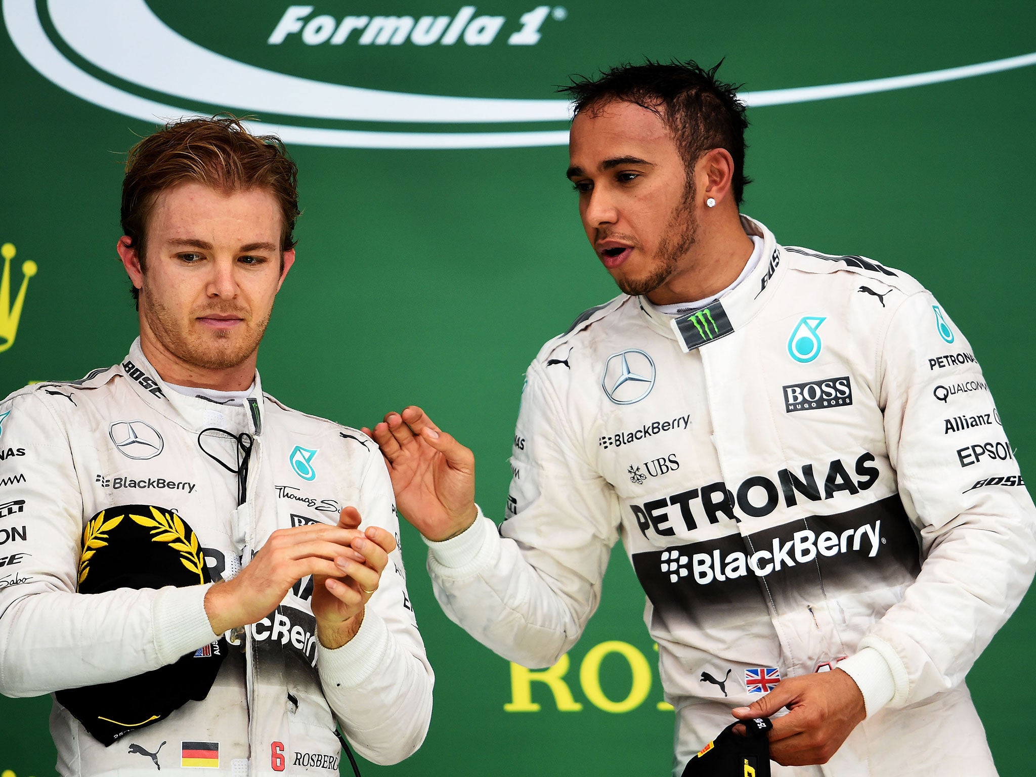 Lewis Hamilton attempts to speak with Nico Rosberg