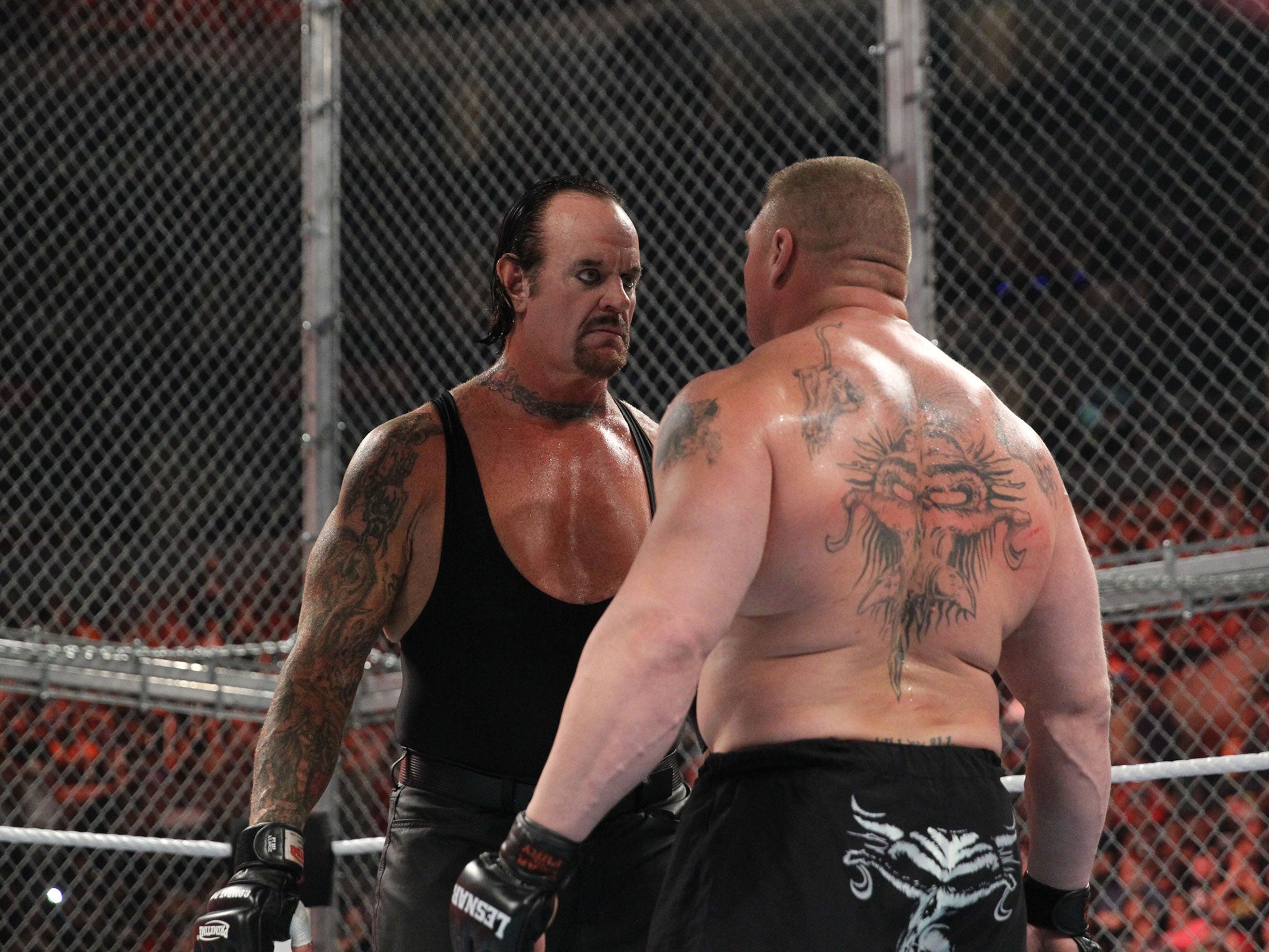 Undertaker stares down Brock Lesnar ahead of their match at Hell In A Cell
