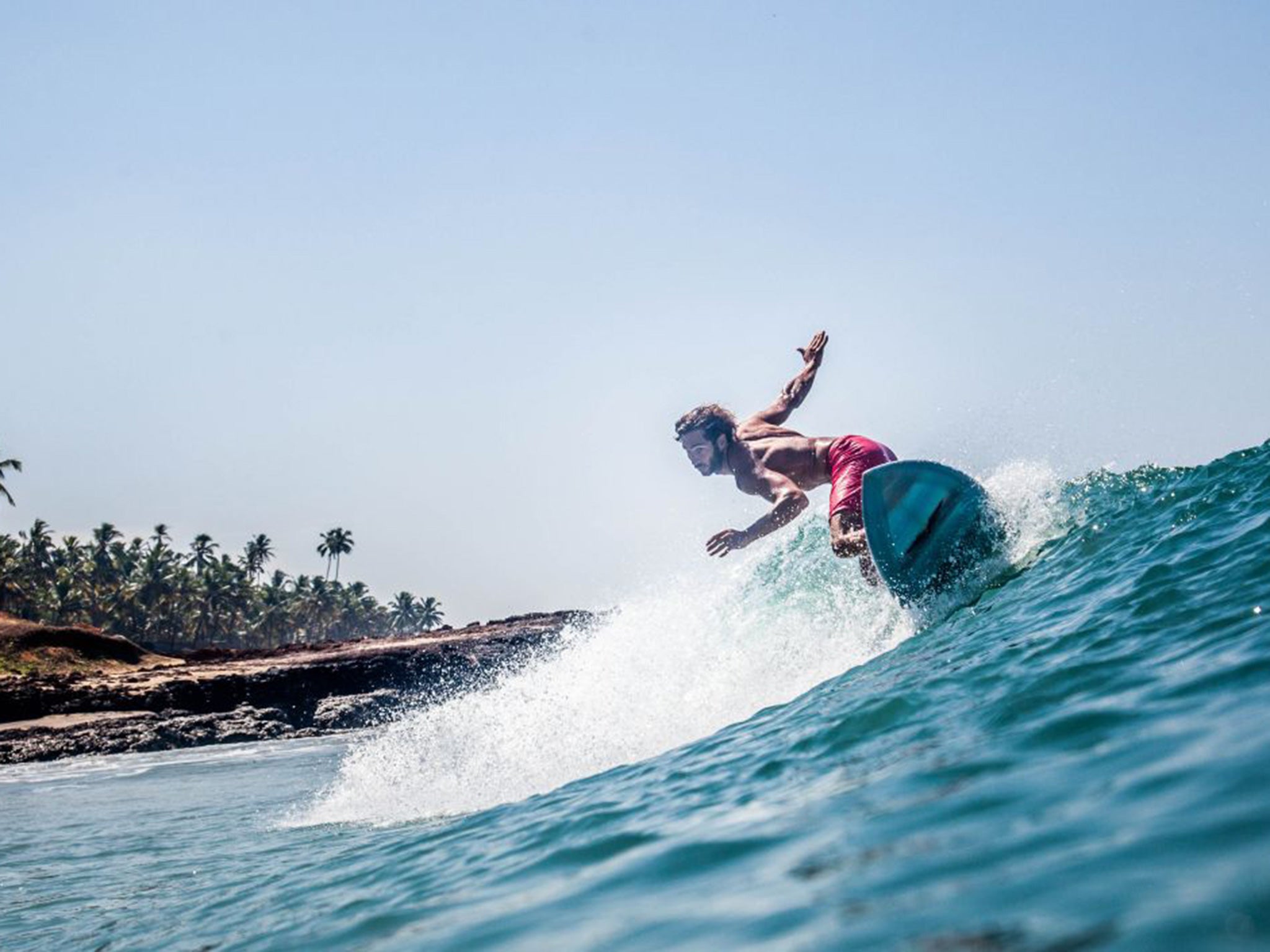 Catching a wave off the Keralan coast