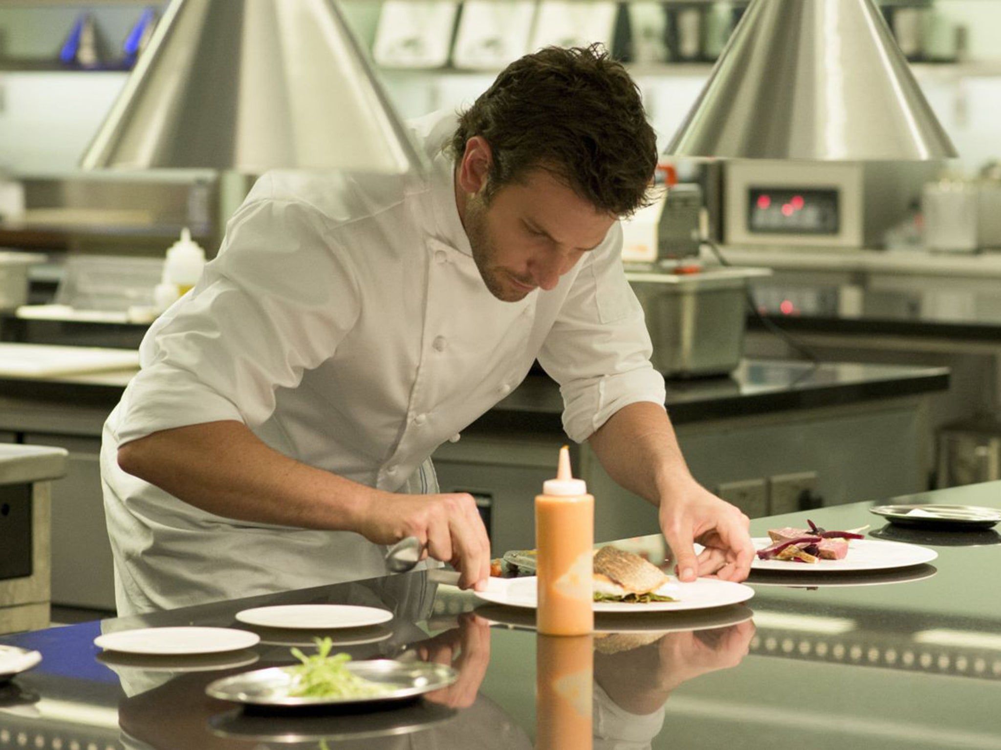 Bradley Cooper stars as a once-successful chef who’s trying to get his career cooking again in ‘Burnt’