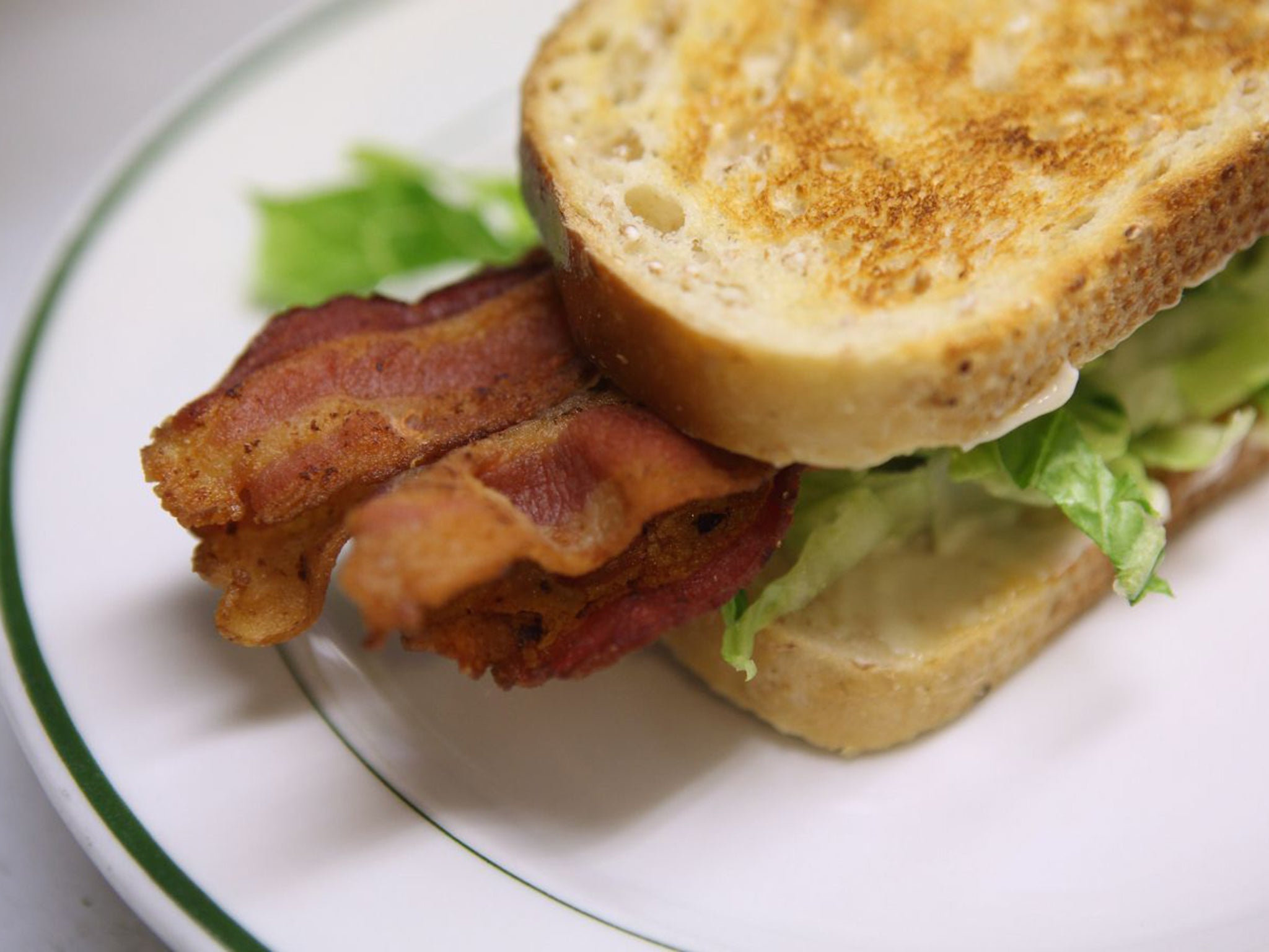 Eating two rashers of bacon a day increases the chance of developing bowel cancer by 18 per cent