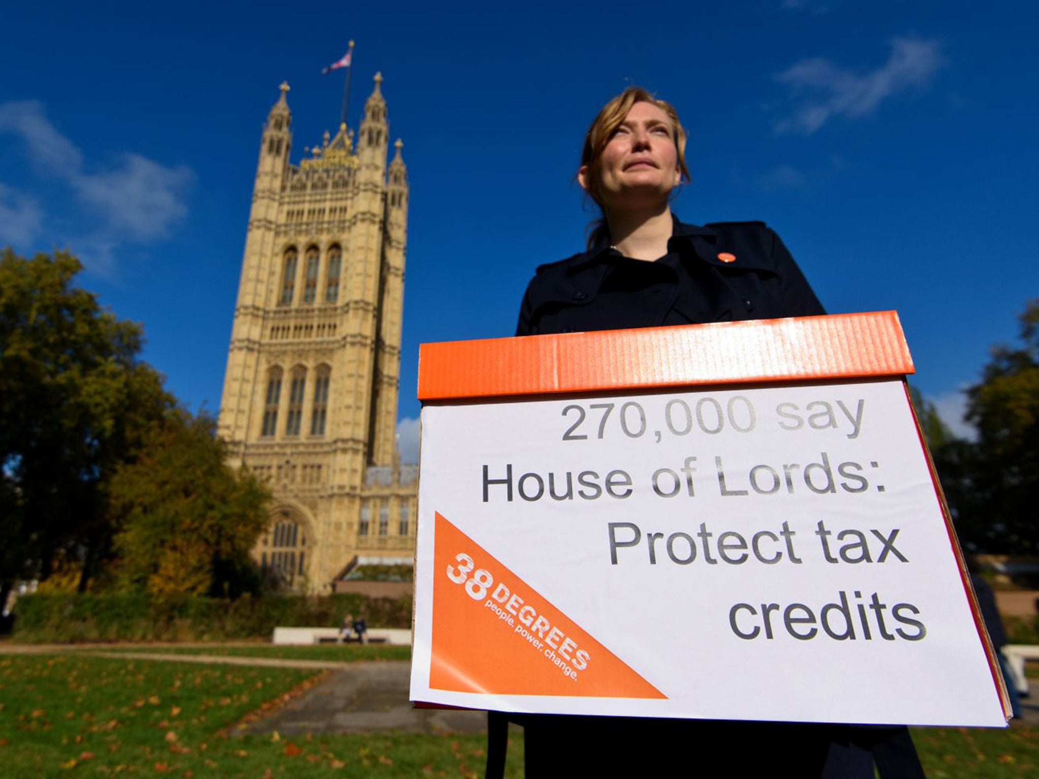 A 38 Degrees campaigner outside the Houses of Parliament. An online campaign sought to drum up support among members of the Second Chamber to vote against motion