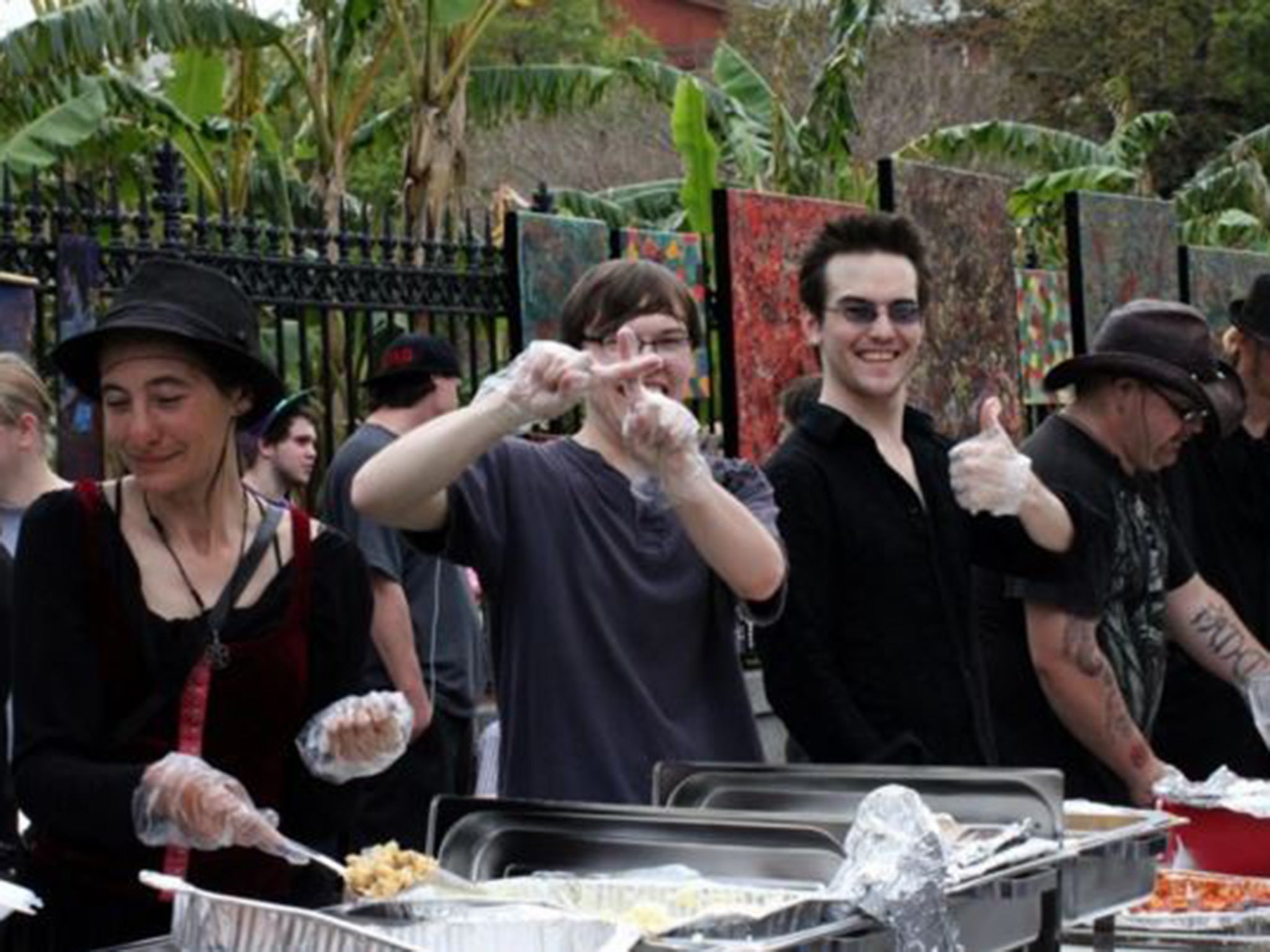 Members of the New Orleans real vampire community hand out food to the homeless