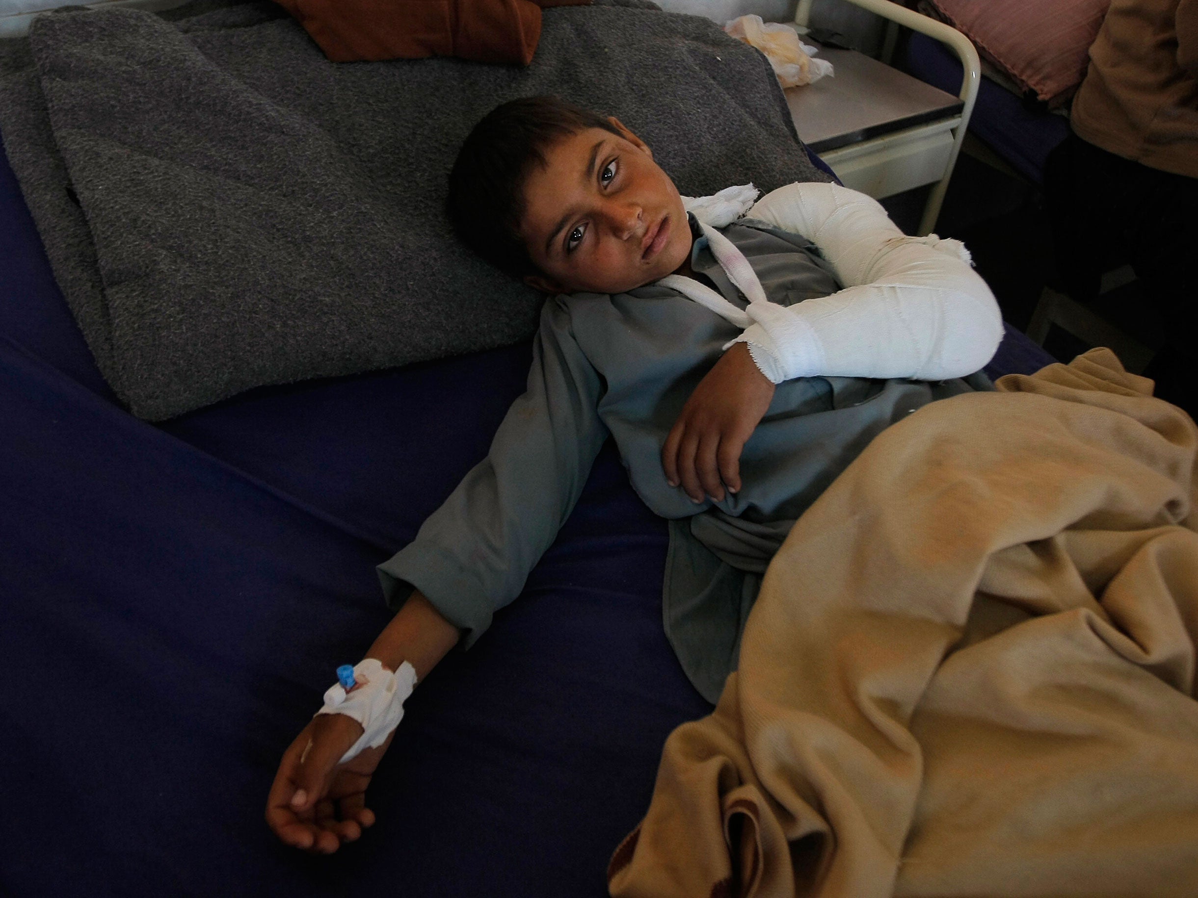 An injured boy rests at a local hospital in Peshawar, Pakistan AP