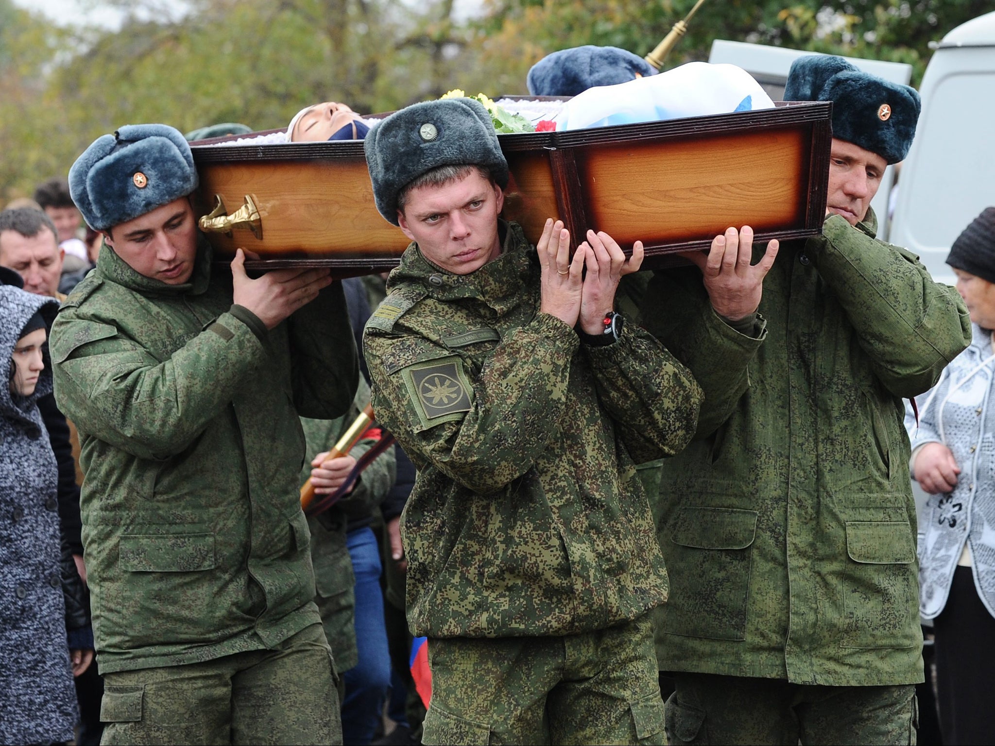 The body of 19-year-old serviceman was returned to his family in southern Russia on the day of his funeral