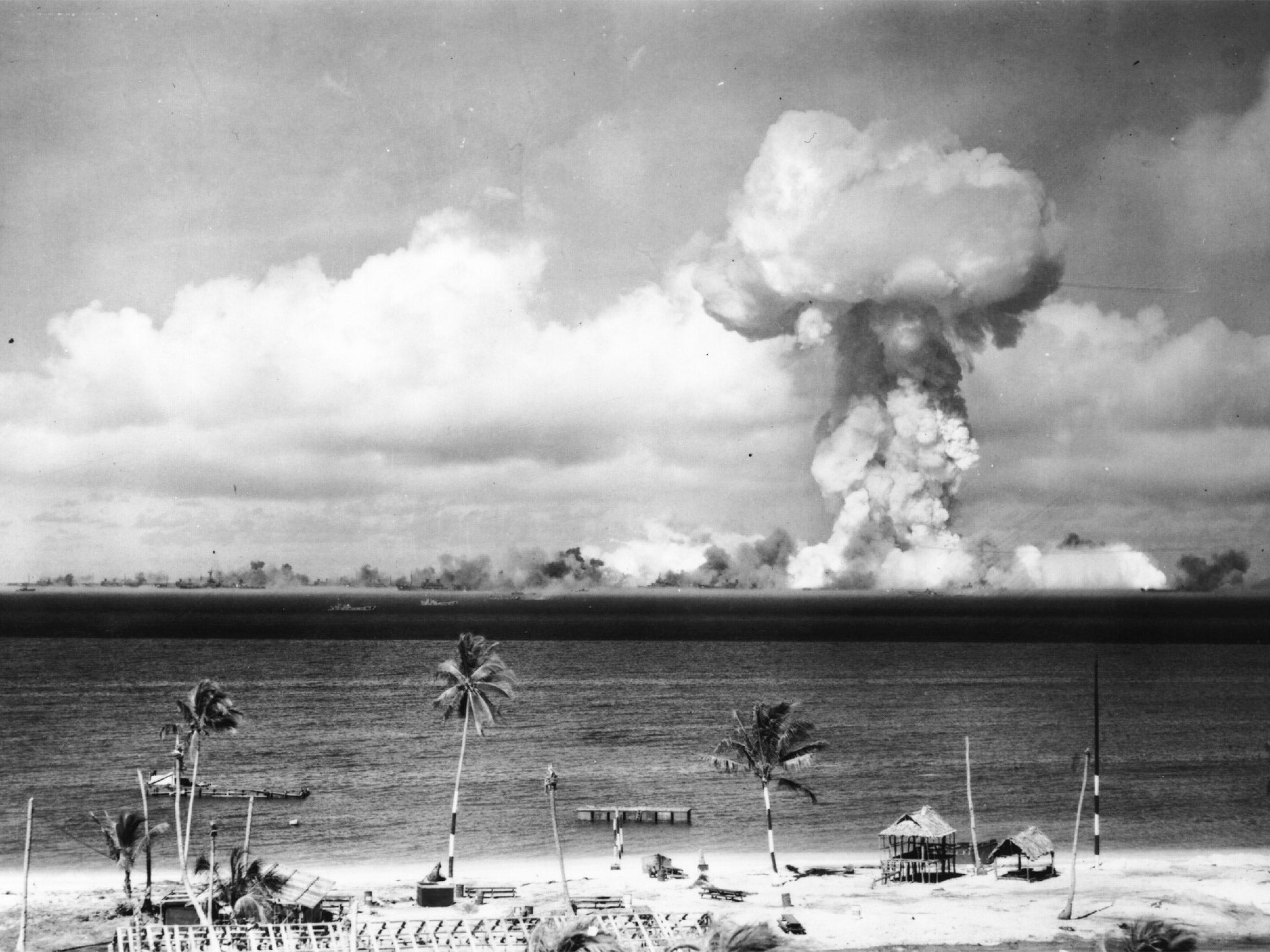 A mushroom cloud forms after the first nuclear test off Bikini Atoll in July 1946