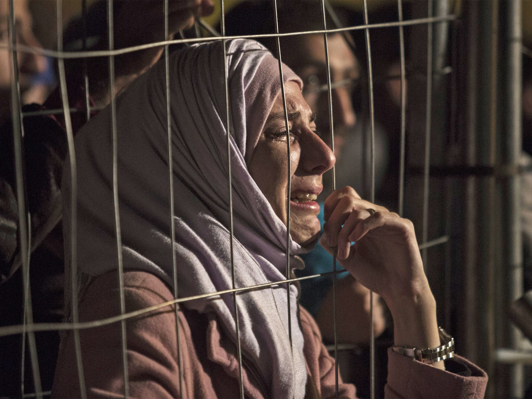 A refugee in the Sentilj camp waiting to cross into Austria