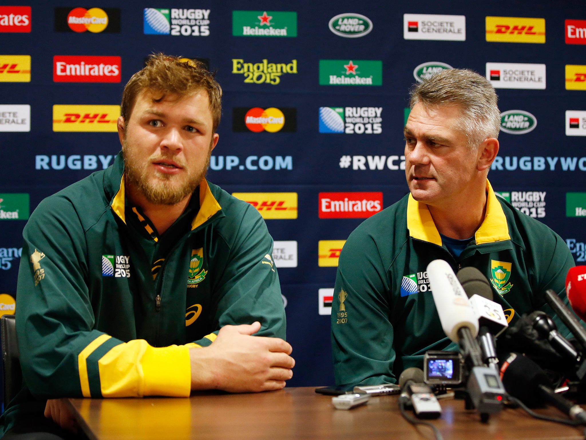 South Africa’s Duane Vermeulen, left, wants Heyneke Meyer, right, to stay on as head coach