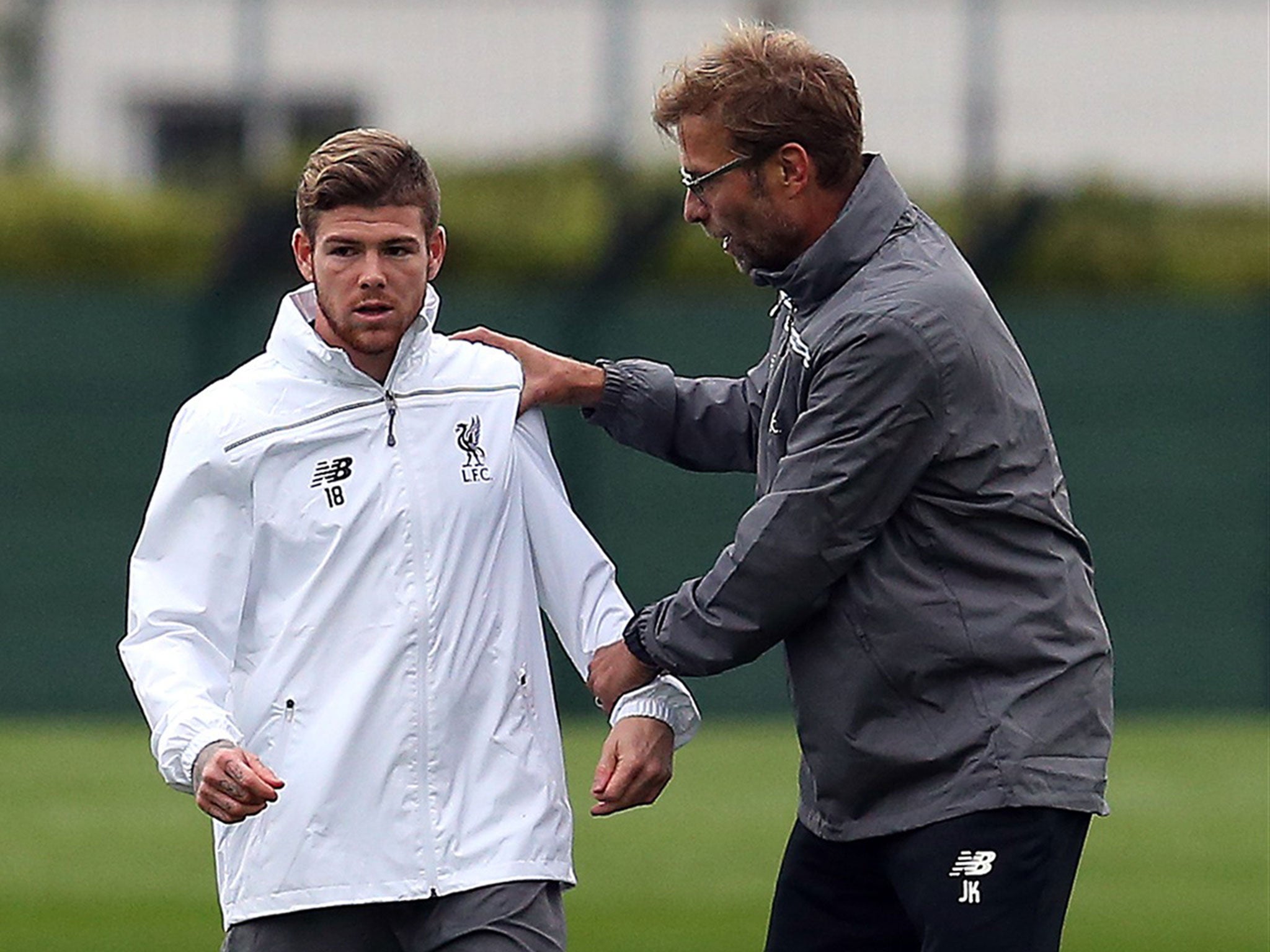 Alberto Moreno with Jurgen Klopp