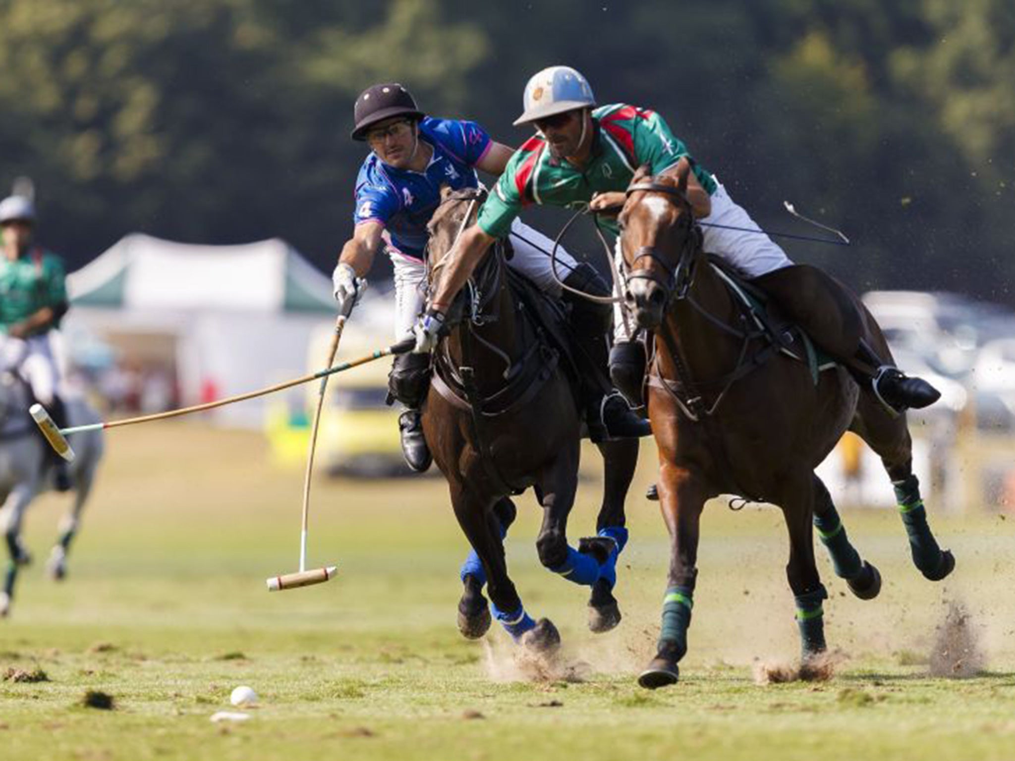 Cambiaso (right) and Pelon Stirling battle for the ball