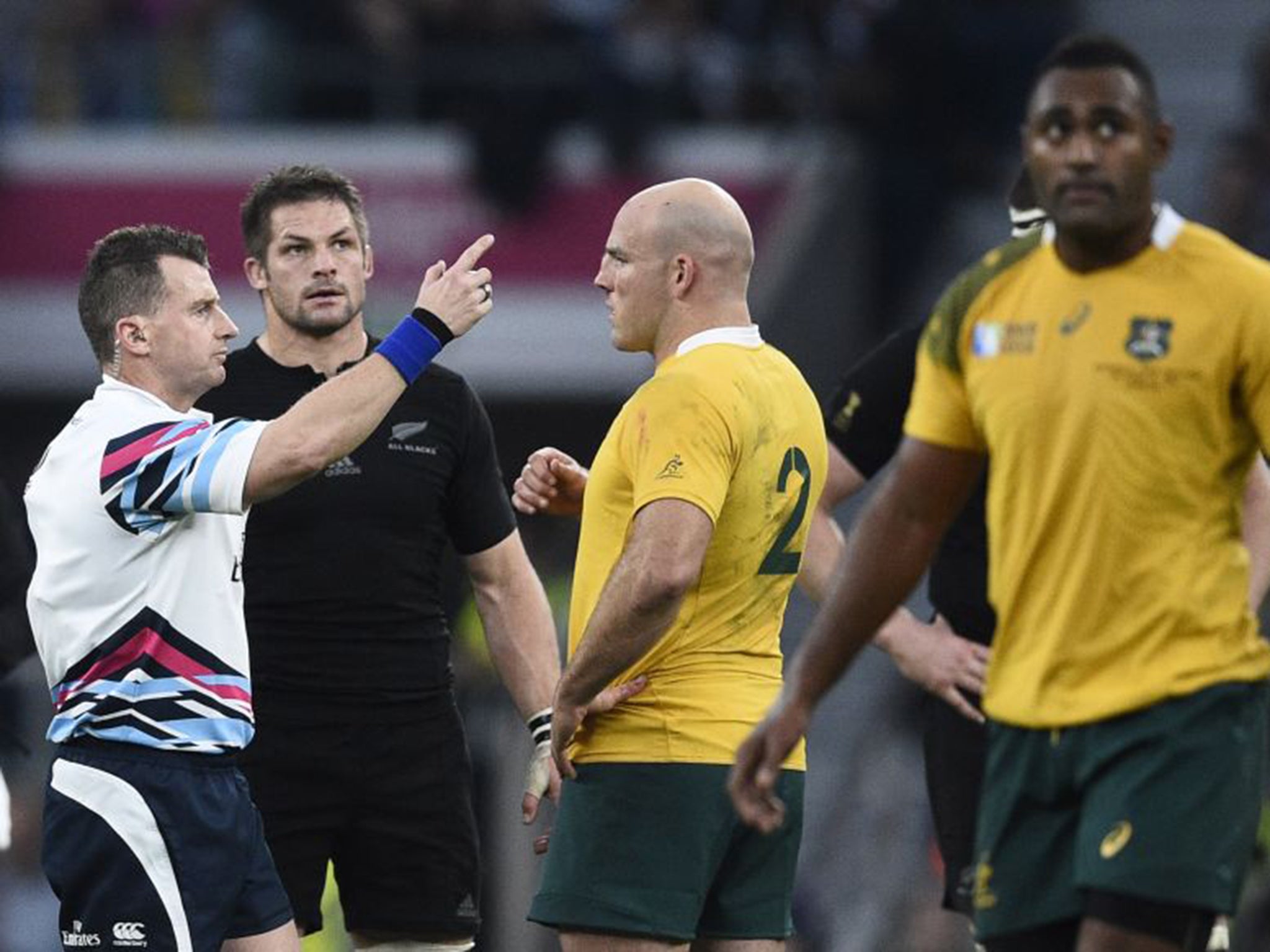 Referee Nigel Owens lays down the law during the World Cup final