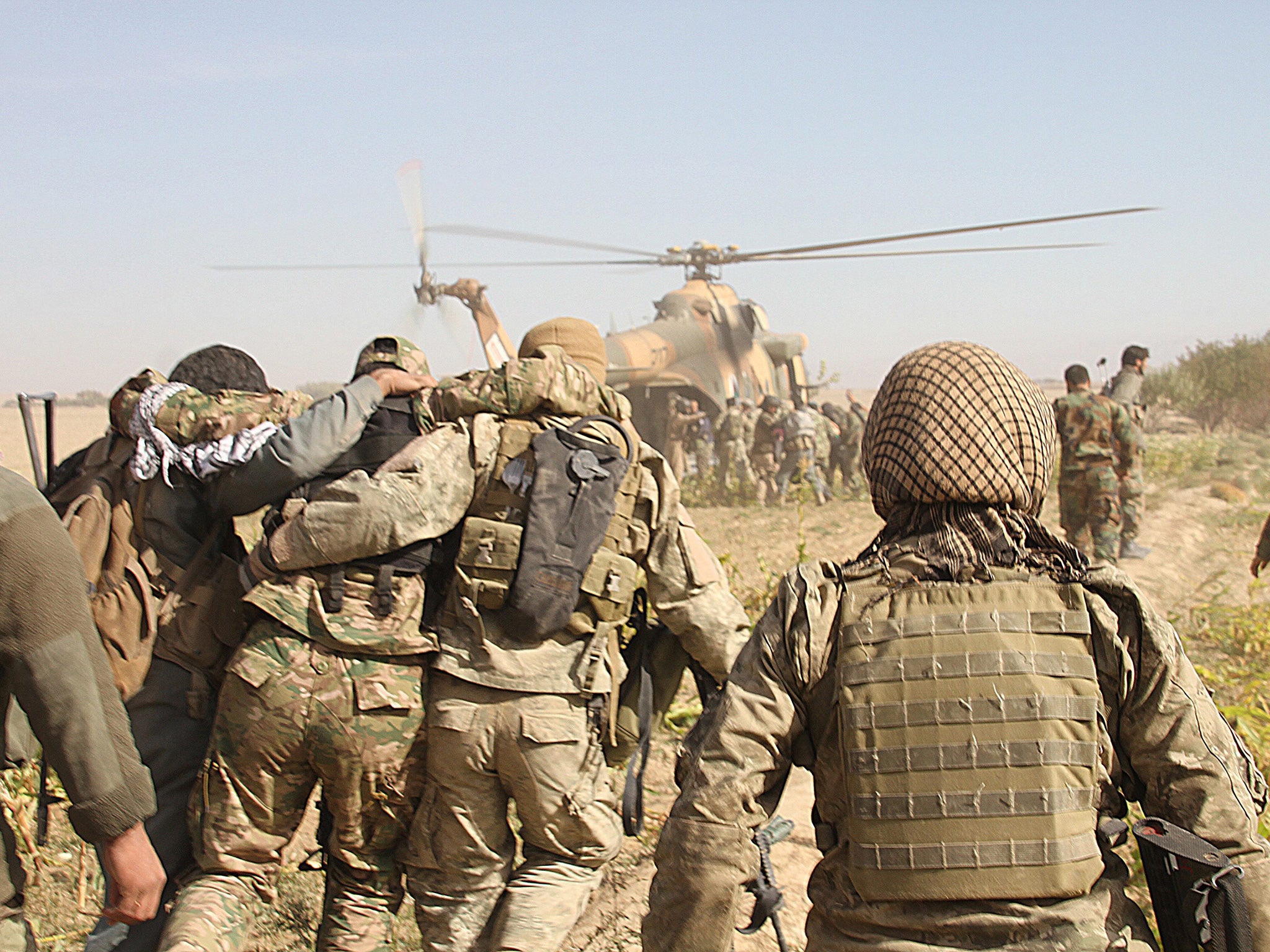 An injured Afghan army soldier in Dasht-e-Archi at the weekend, where troops recaptured territory from the Taliban