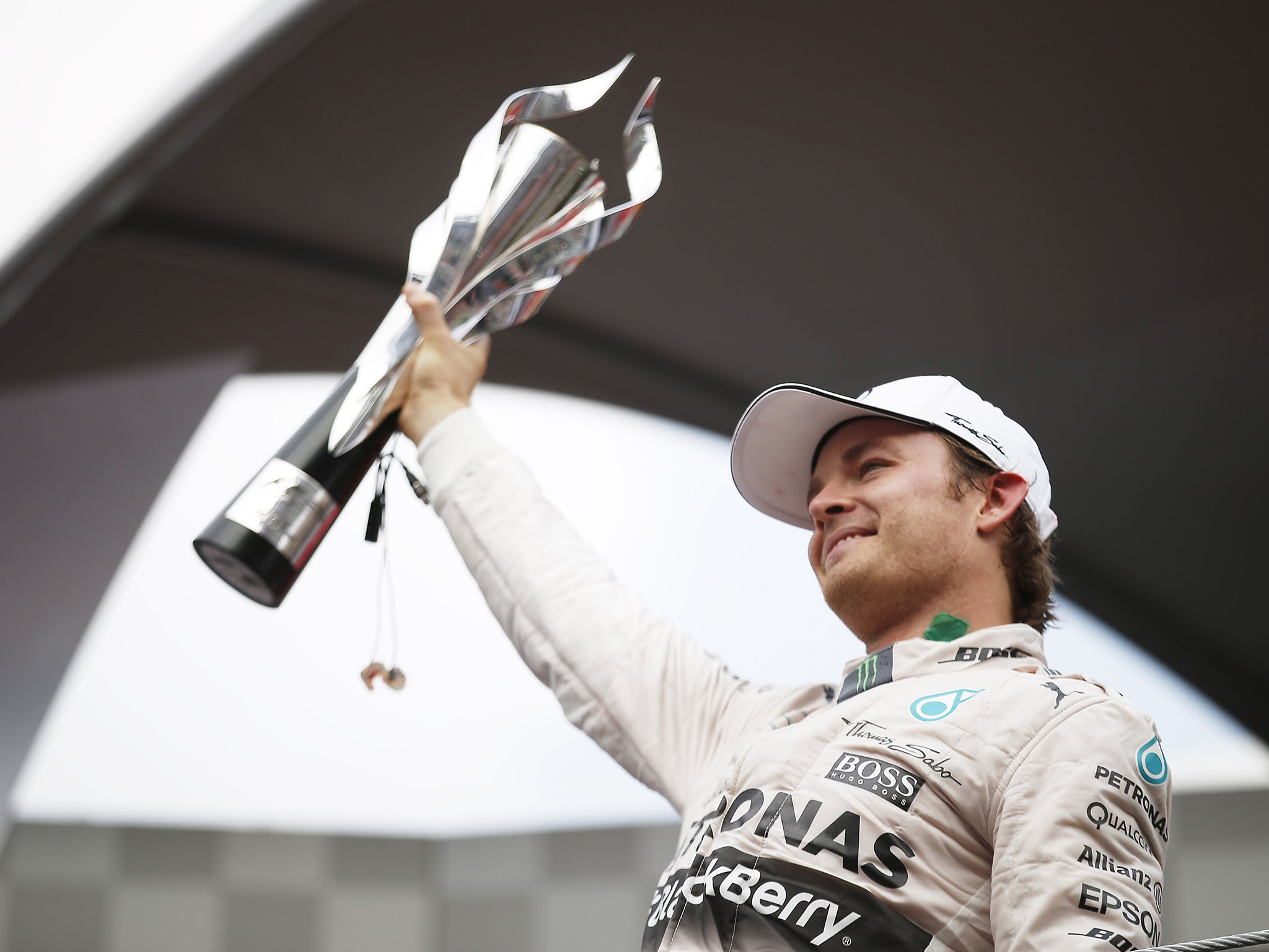 Nico Rosberg celebrates on the podium