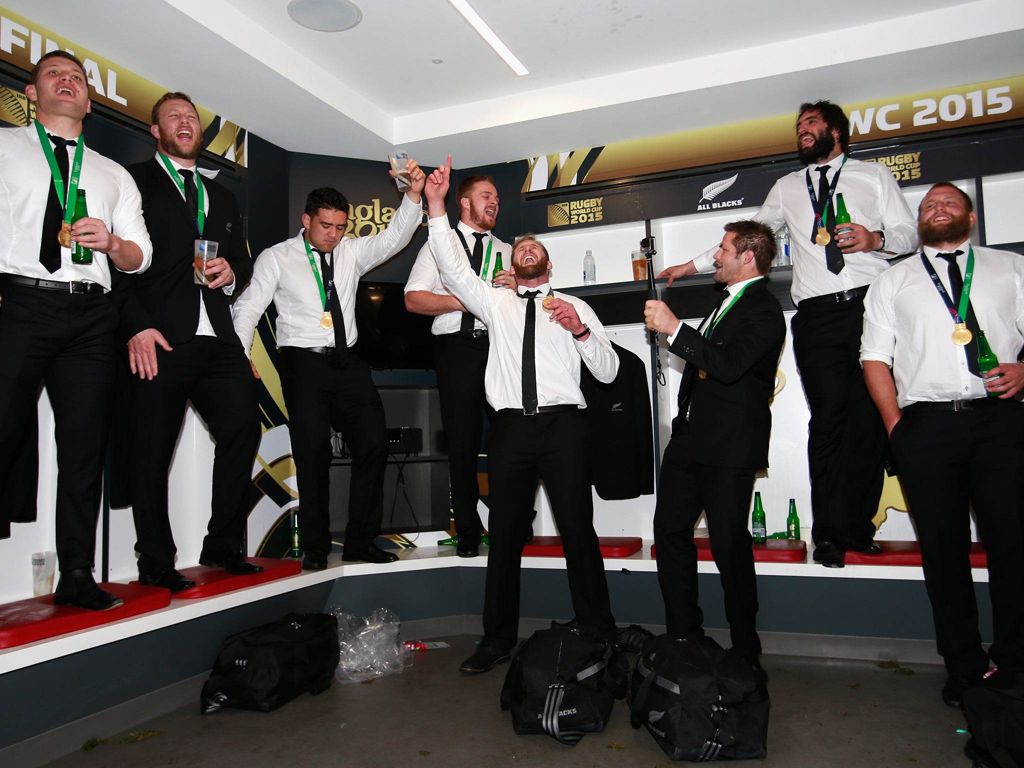 The All Blacks celebrate in the dressing room