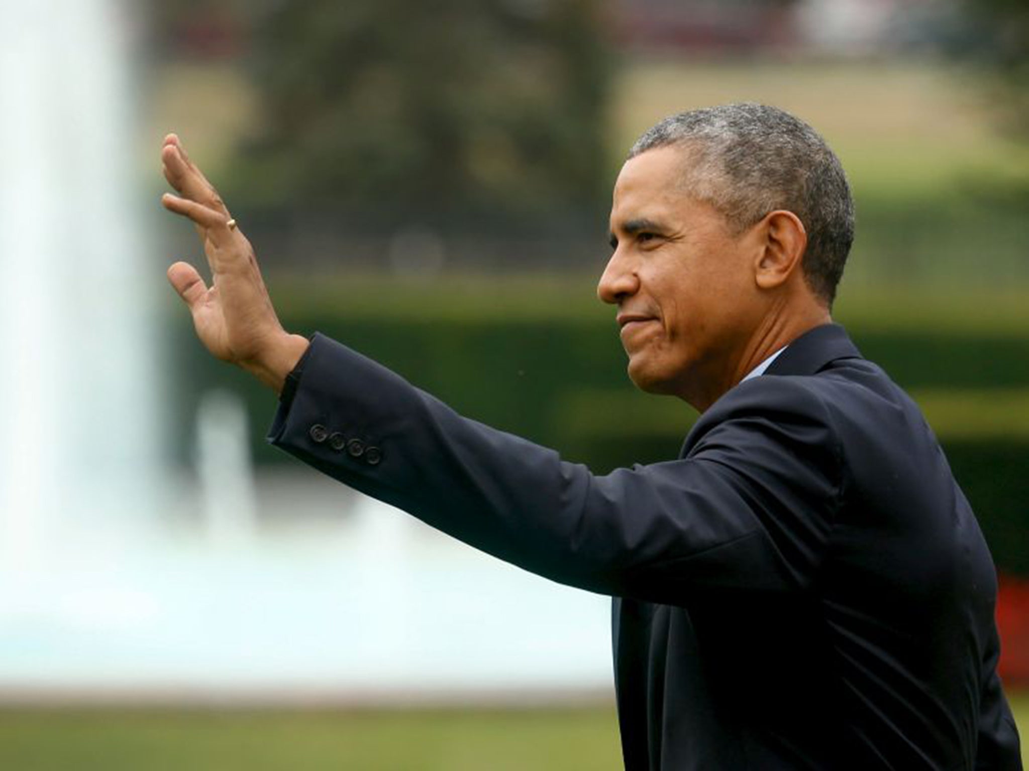 Barack Obama waves to visitors on the White House lawn. Reforming the US justice system has become a priority for the President