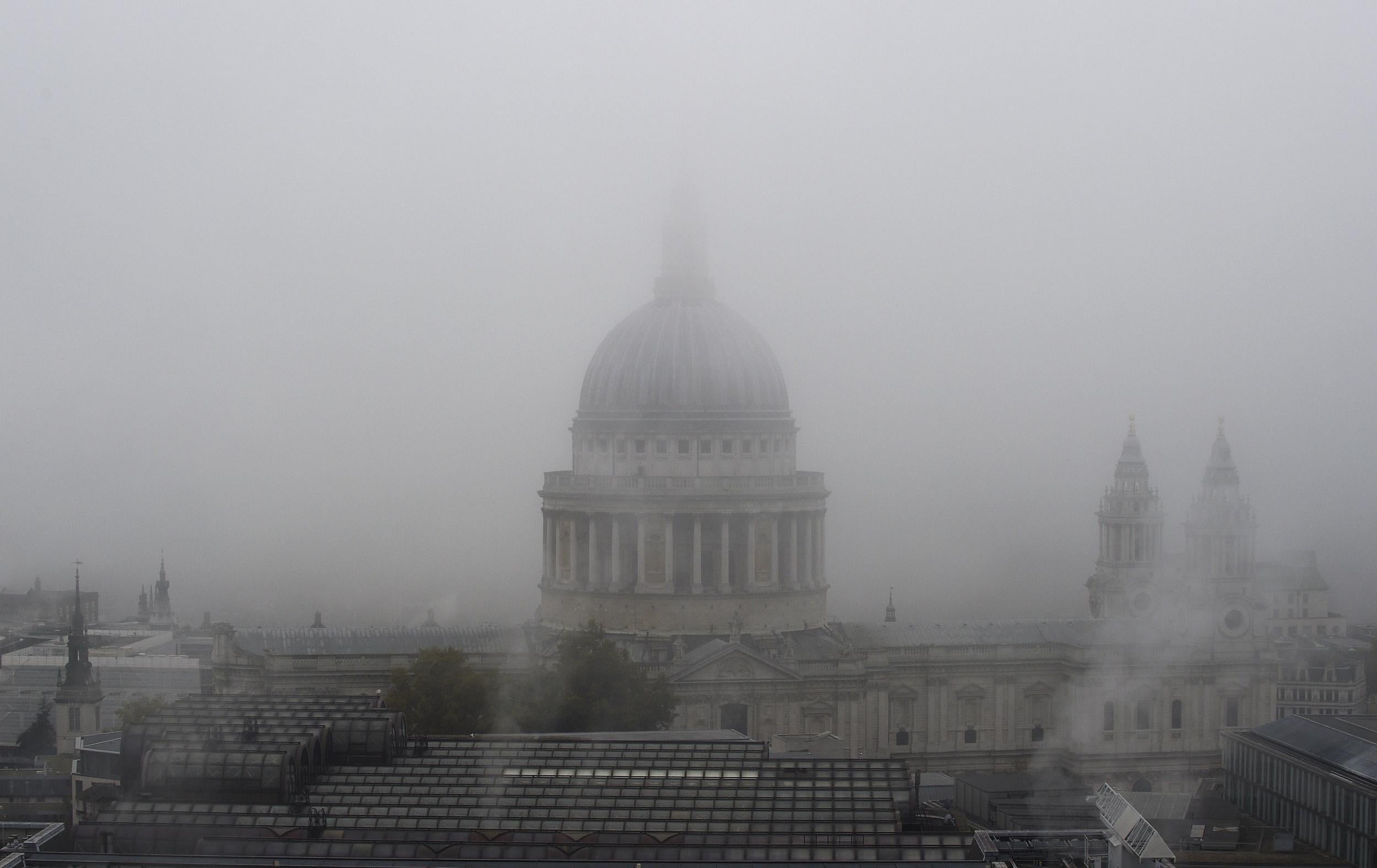 Fog shrouds St Paul's Cathedral in central London