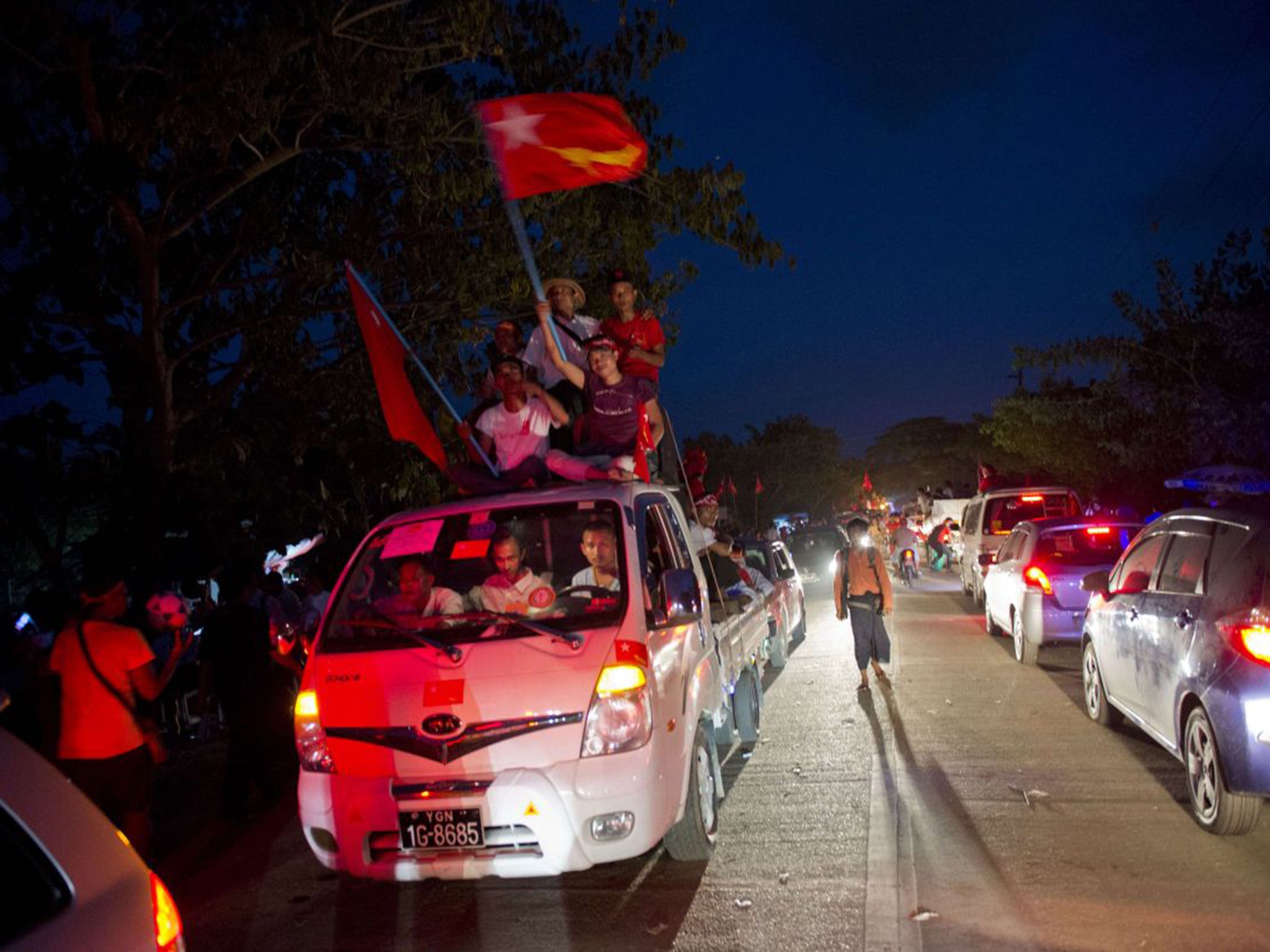 &#13;
Aung San Suu Kyi’s supporters attend a rally in Rangoon &#13;