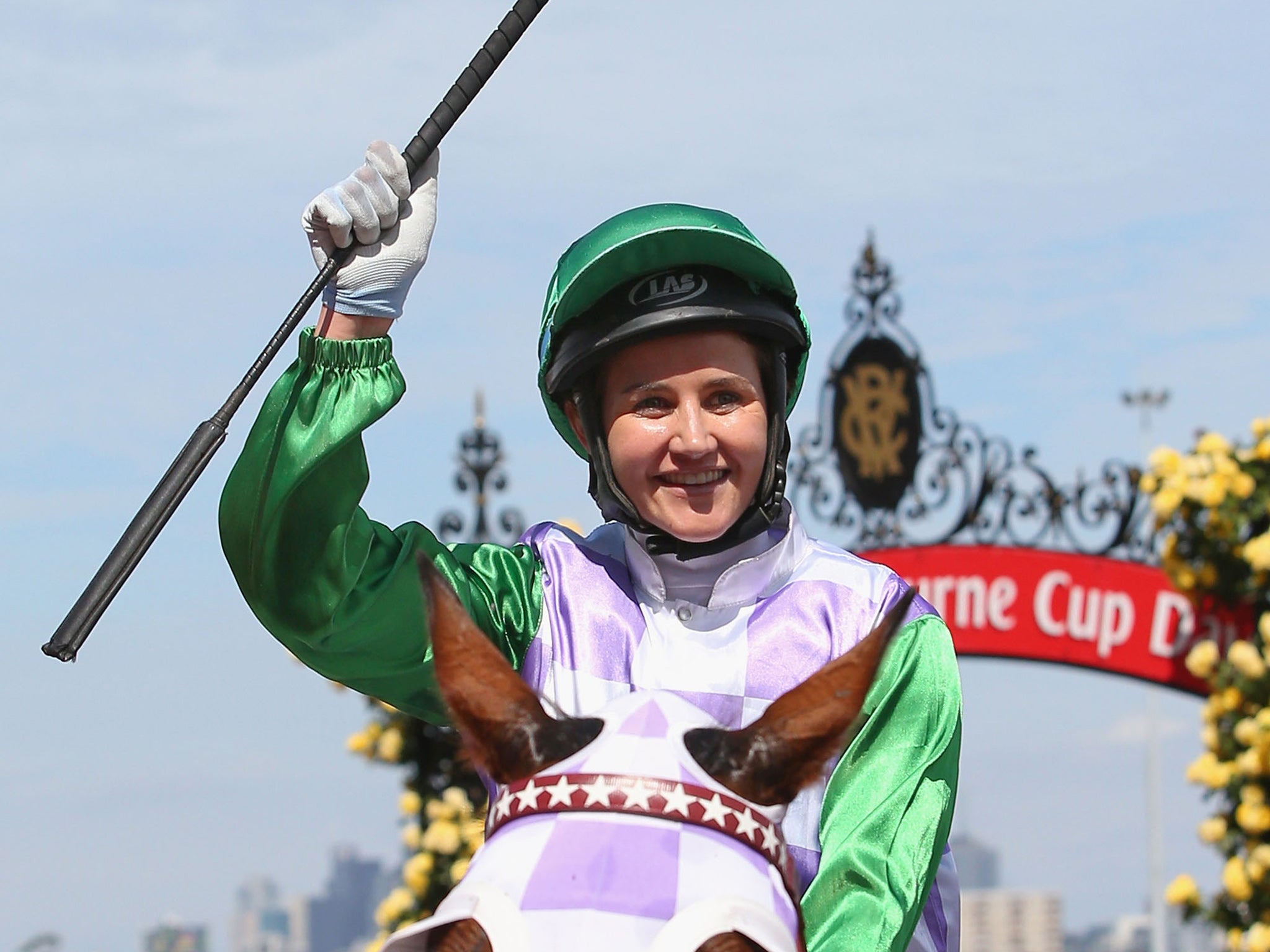 Michelle Payne celebrates her Melbourne Cup triumph