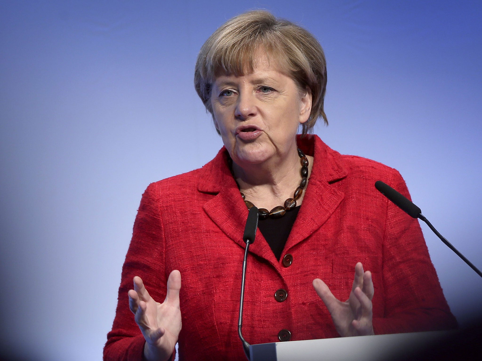 German Chancellor Angela Merkel delivers a speech during a reception of the Federation of German Industries (BDI) in Berlin, Germany, 3 November 2015