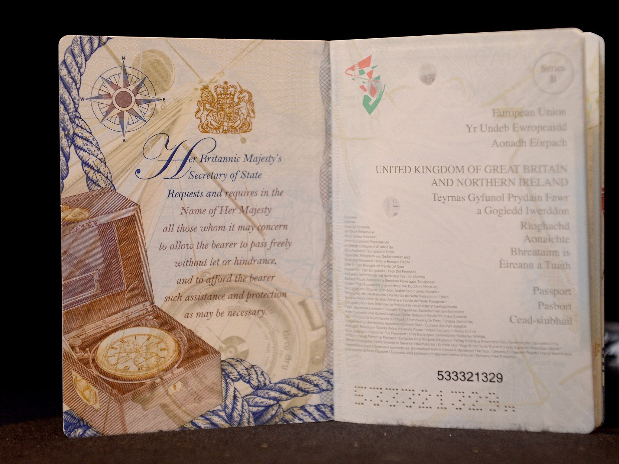 The opening pages from the new British passport design that have been unveiled at Shakespeare's Globe Theatre in London