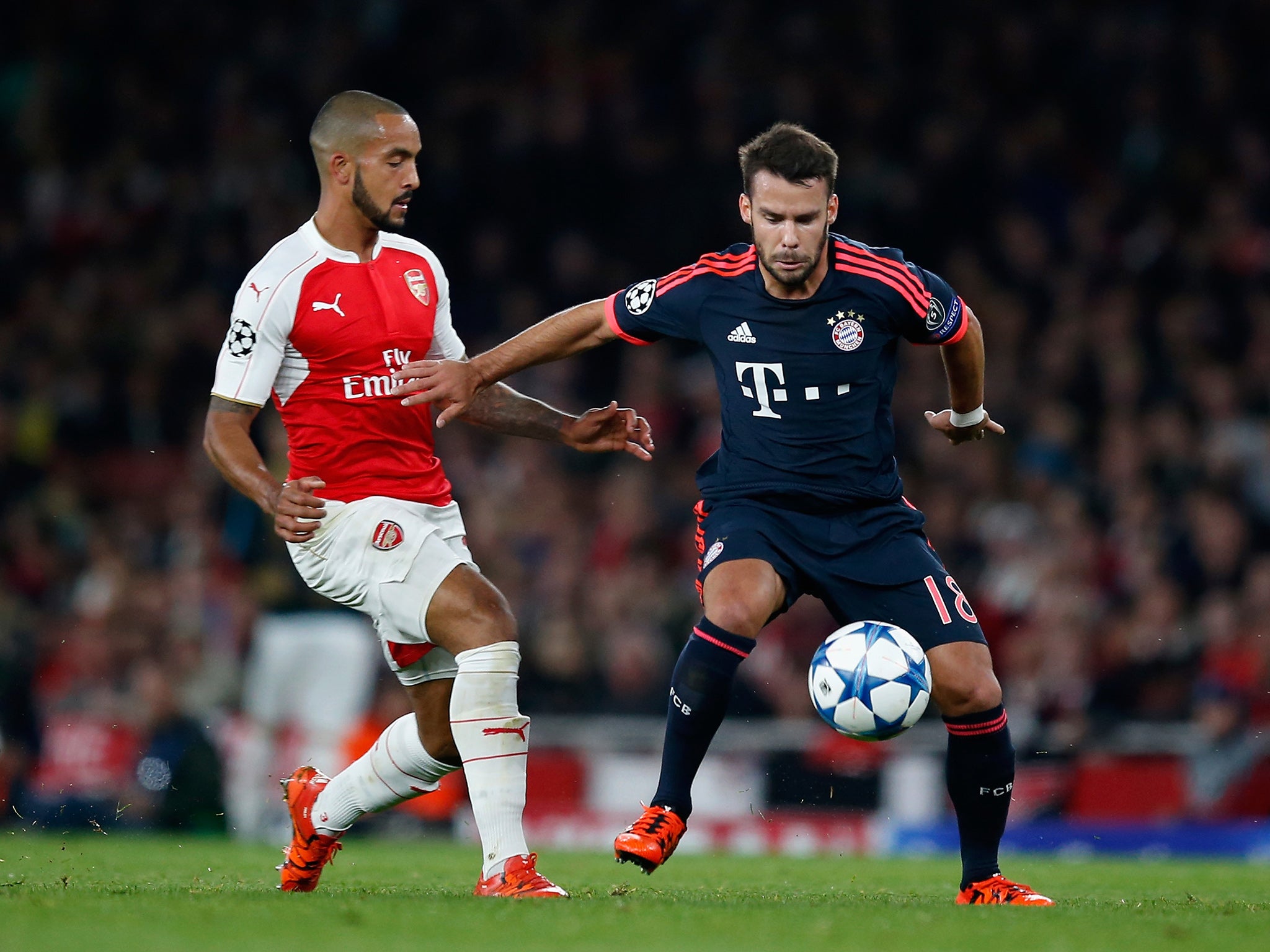 Arsenal forward Theo Walcott takes on Juan Bernat in the last encounter between these two sides.