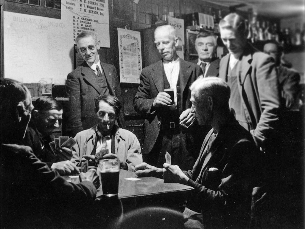 Plastered past: a group of men playing cribbage in Kelsale Men’s Institute in Suffolk in 1949 (Getty)