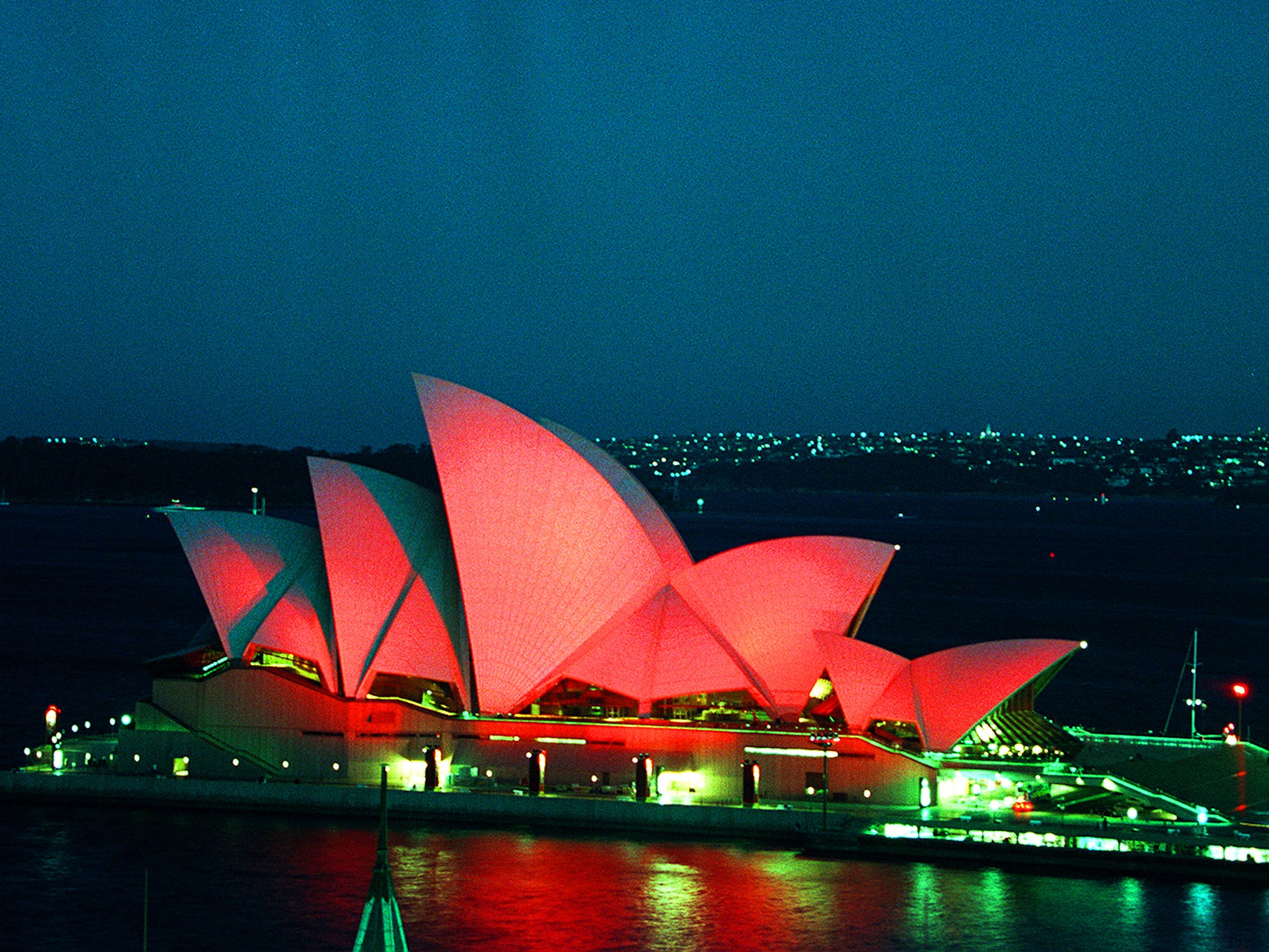 The Sydney Opera House, lit red, in 1999