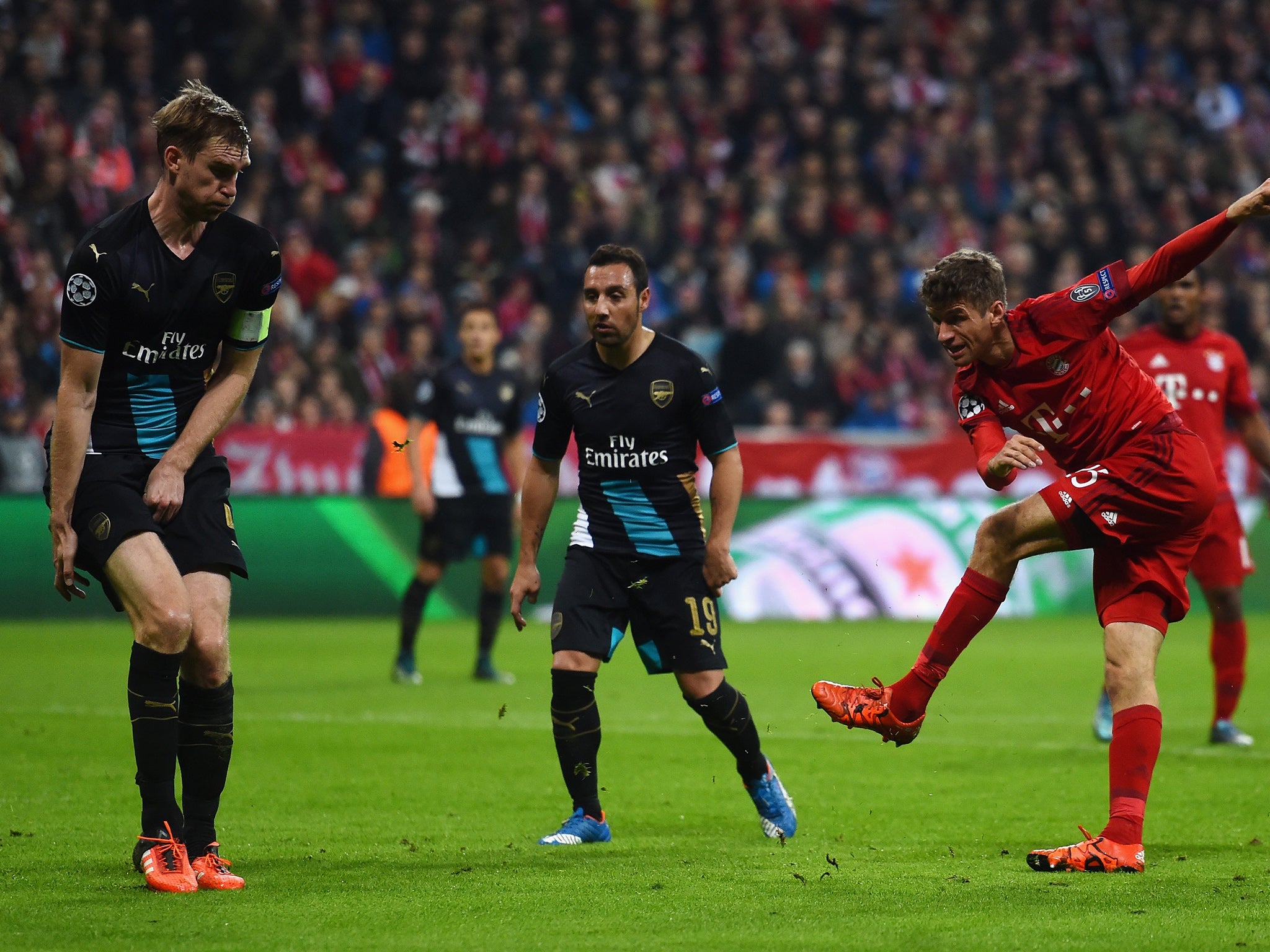 &#13;
Thomas Muller strikes his first of the game&#13;