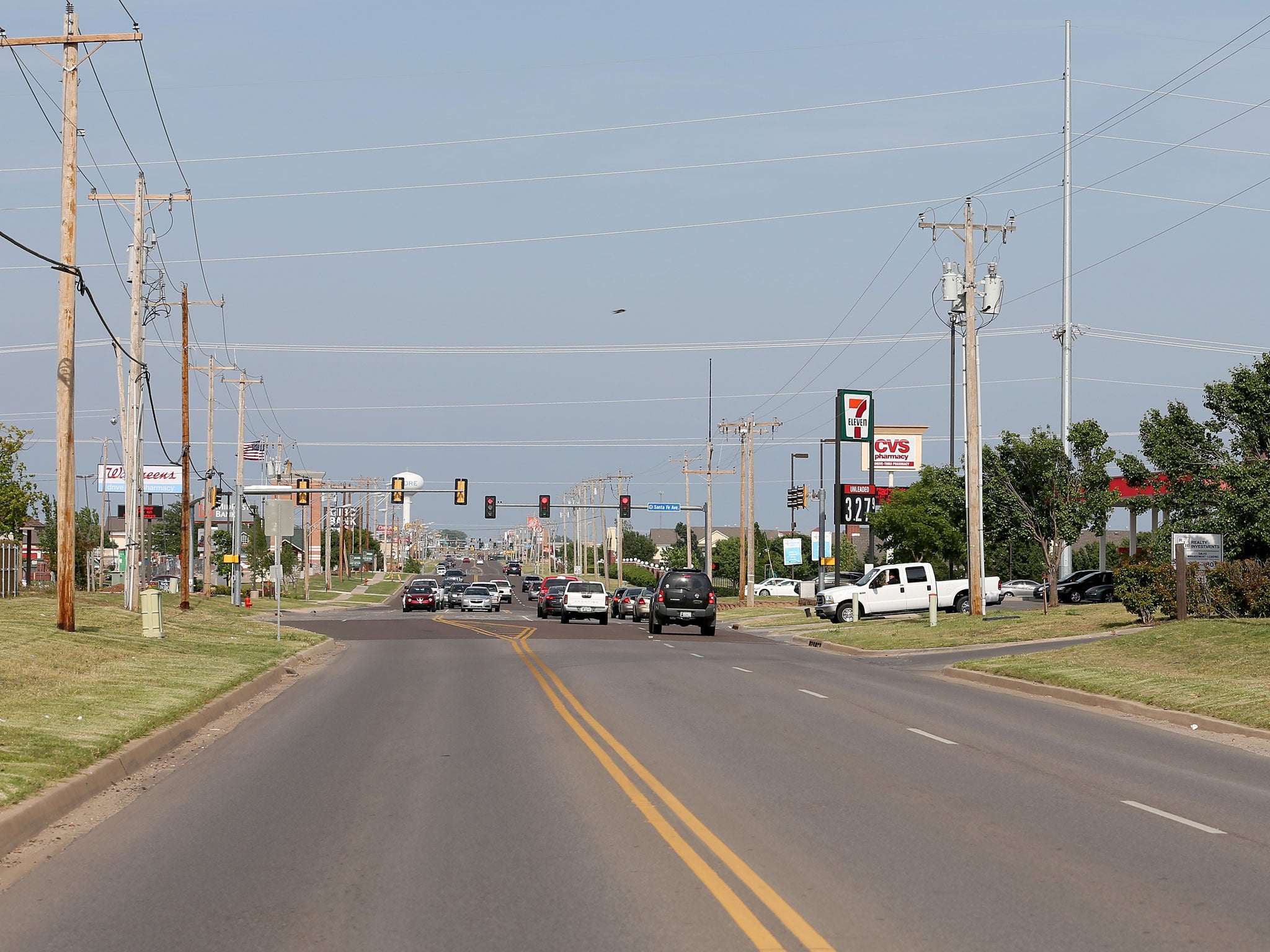 Oklahoma City is one of the US's most spread-out urban environments, which means the 600,000 residents rely on cars and there are so many freeways that they quip 'you can get a speeding ticket at rush hour' (Getty)