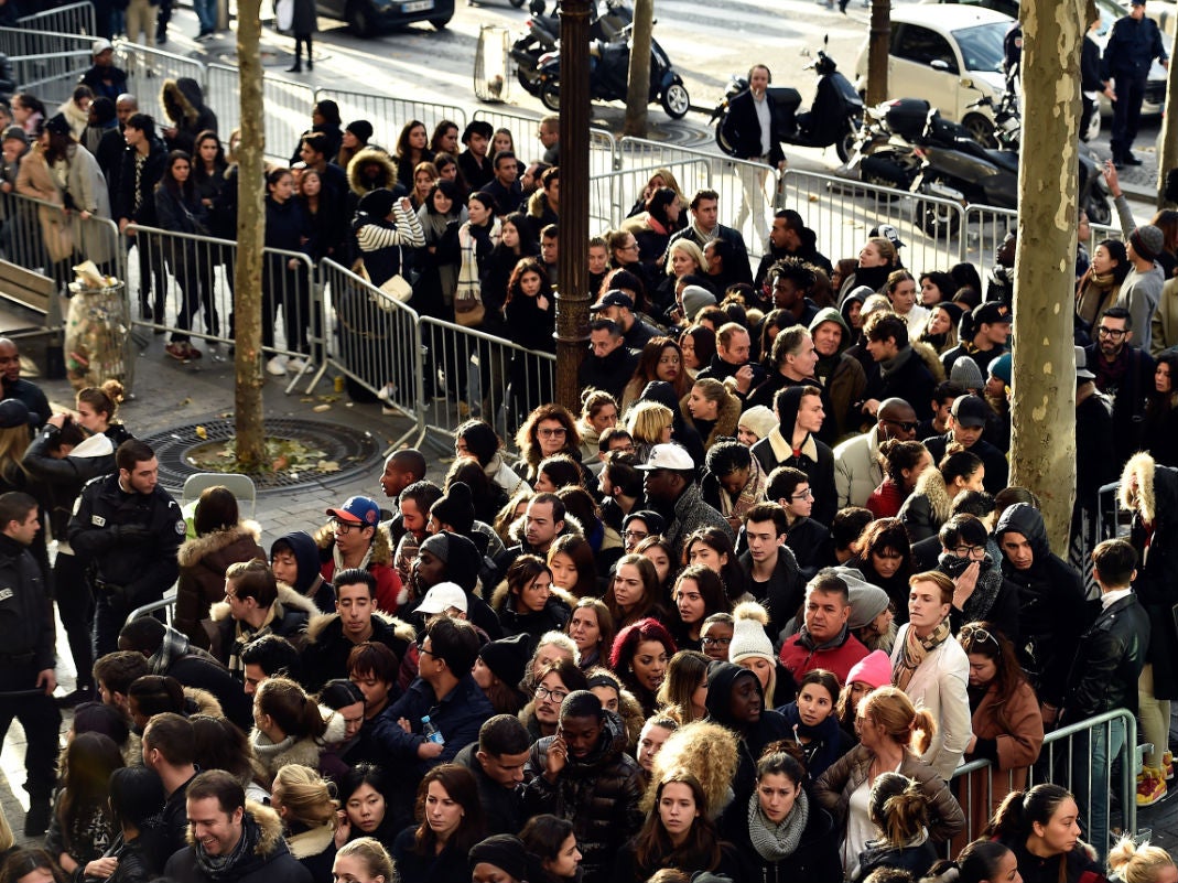 People wait to enter H&amp;M before the Balmain X H&amp;M Collection Launch