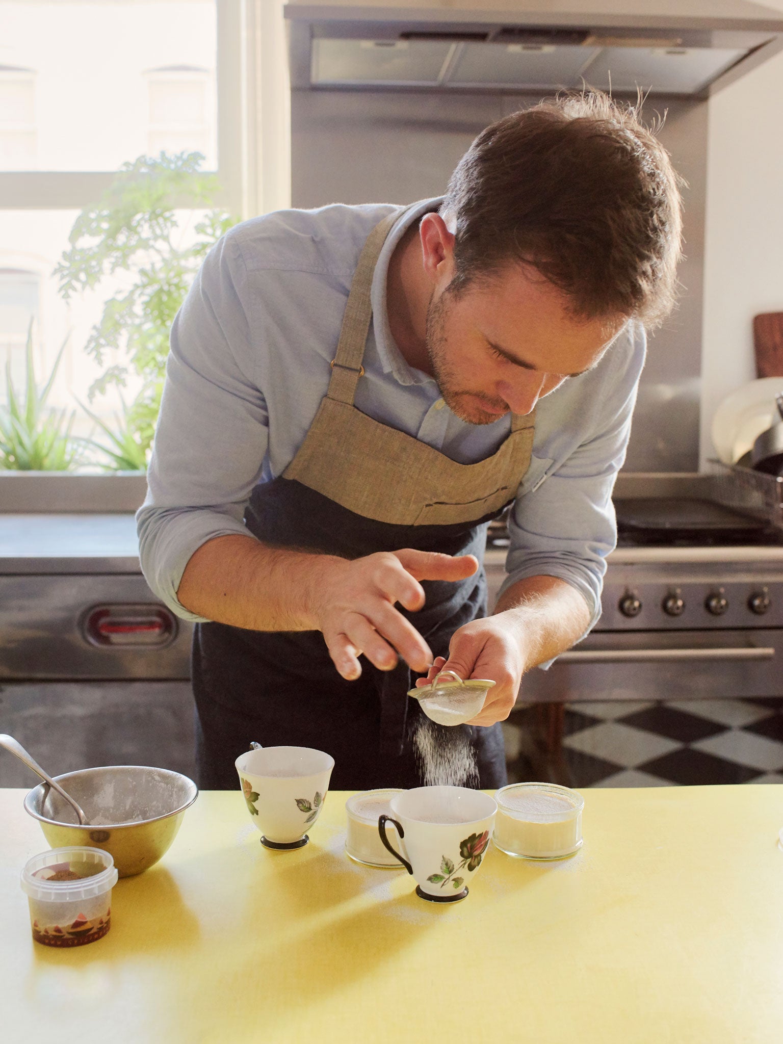 Ed prepares his cardamom burnt creams