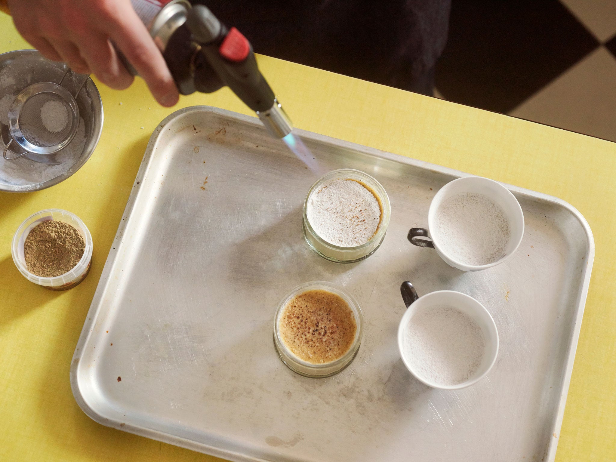 Ed caramelises his cardamom burnt creams with a blowtorch