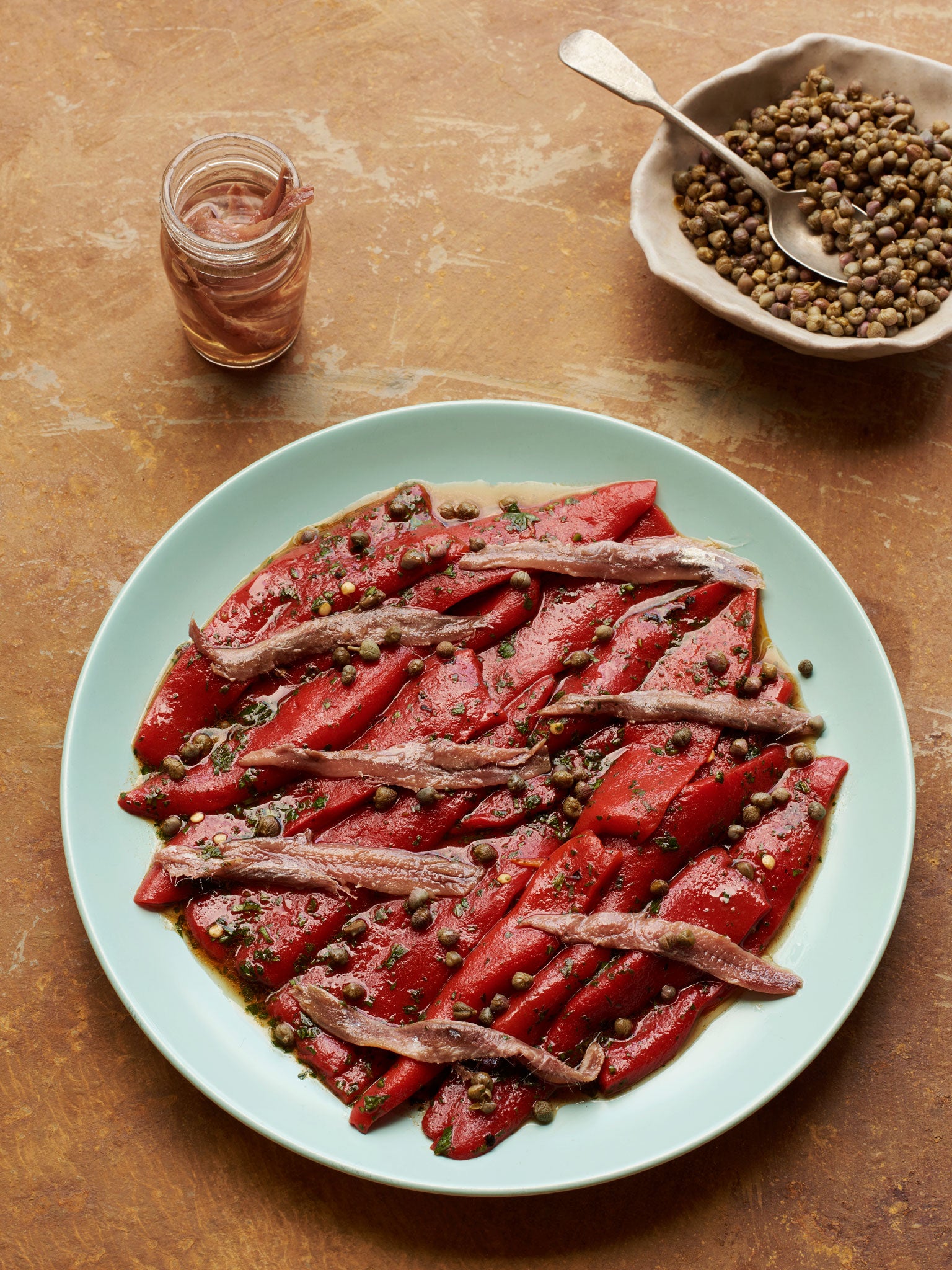 Anchovies and smoky peppers with capers – eat with well-toasted/near-blackened sourdough bread or ciabatta