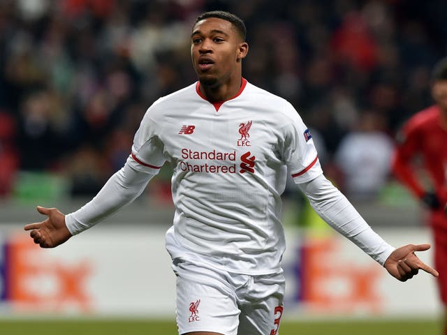 <p>Ibe, pictured playing for Liverpool in 2015, has been charged with possessing or controlling an article for use in fraud</p>