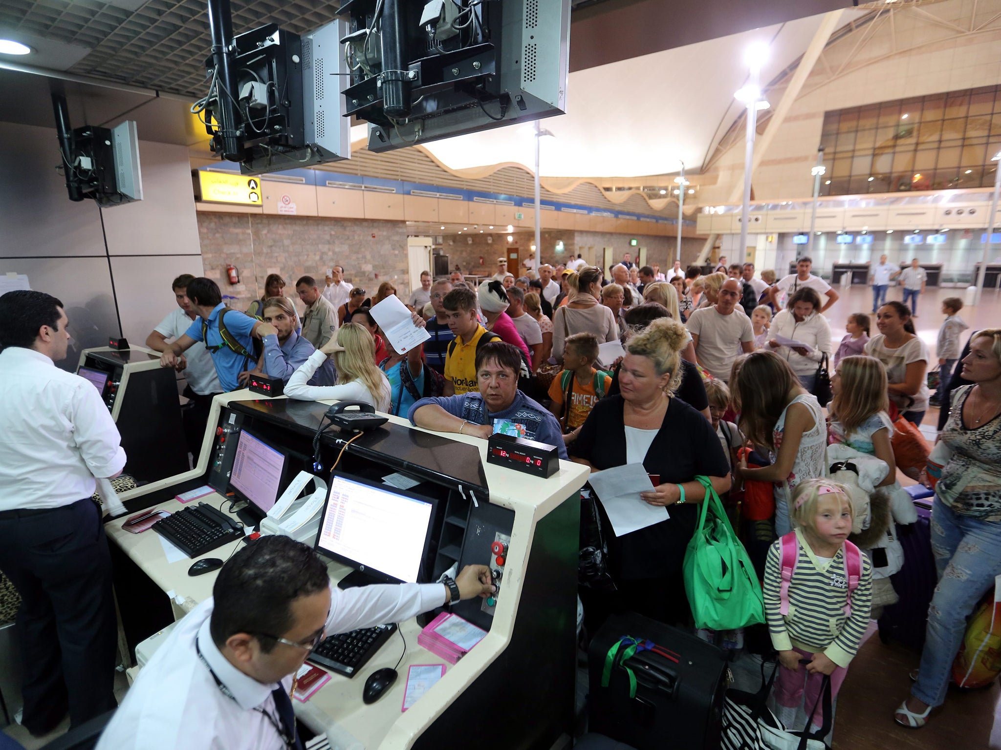 Russian tourists, leave at the Sham el-Sheikh airport in Sharm el- Sheikh, Egypt