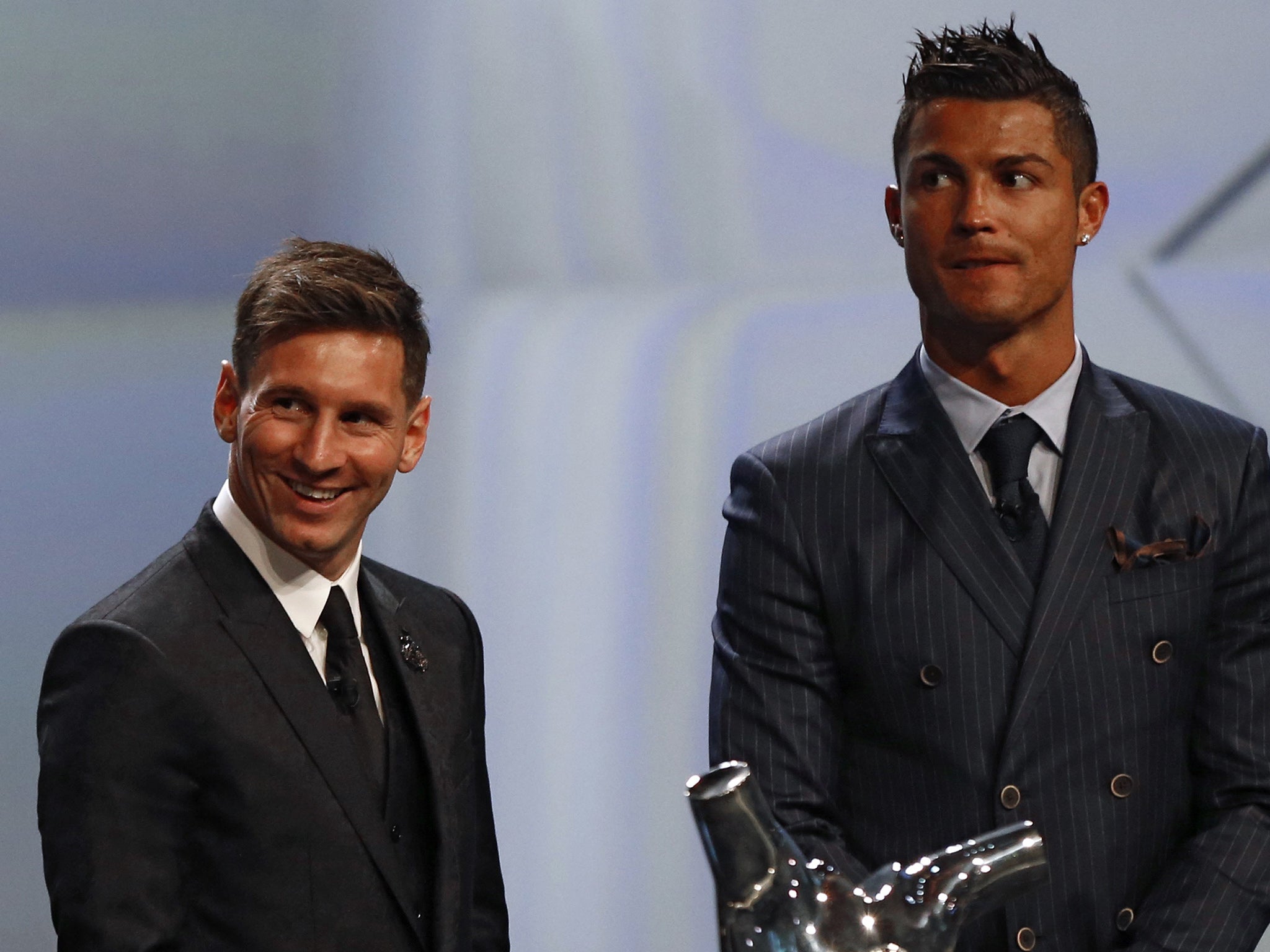 Cristiano Ronaldo (right) with arch-rival Lionel Messi