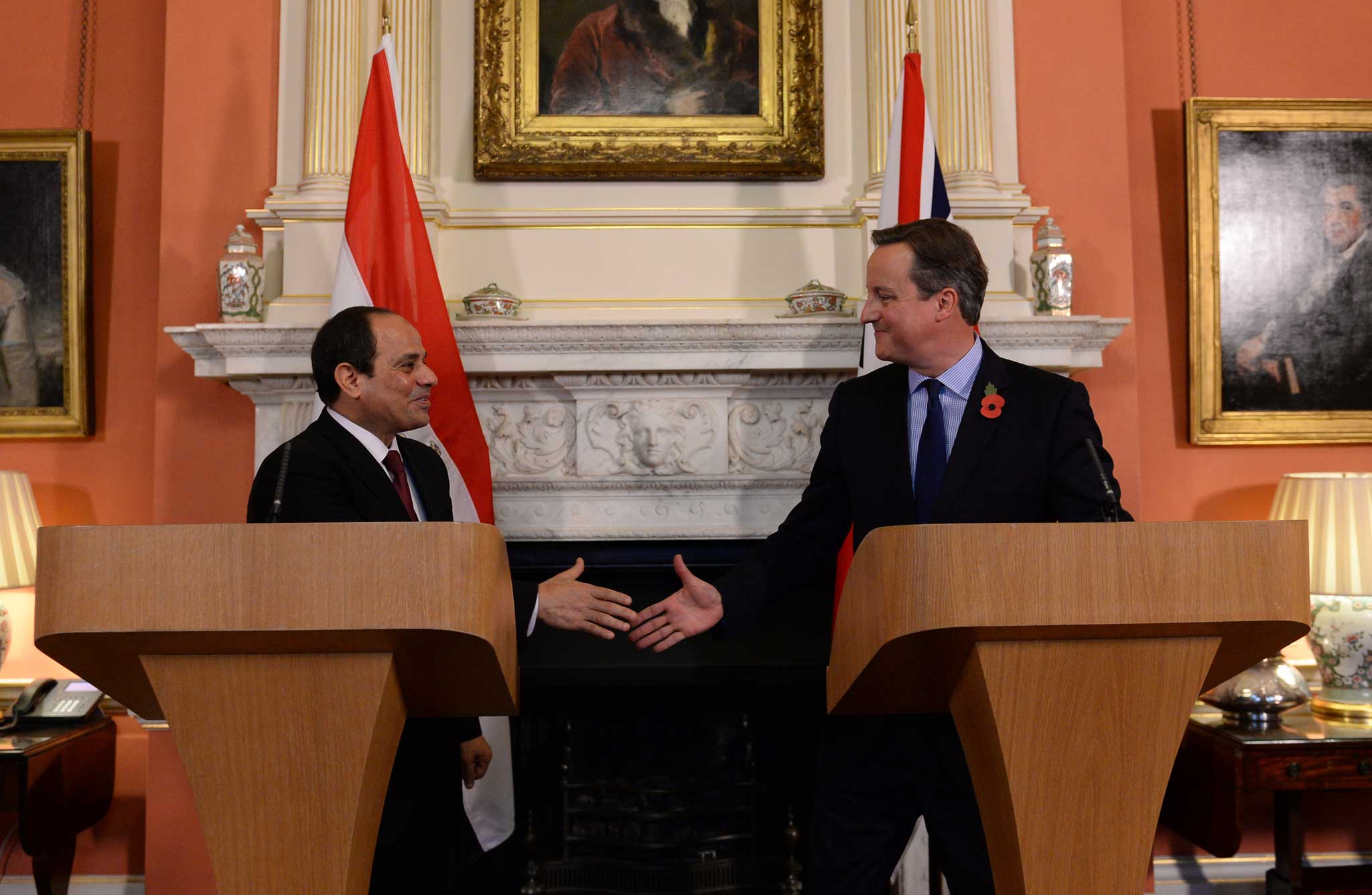 David Cameron shakes hands with Sisi during a news conference at 10 Downing Street