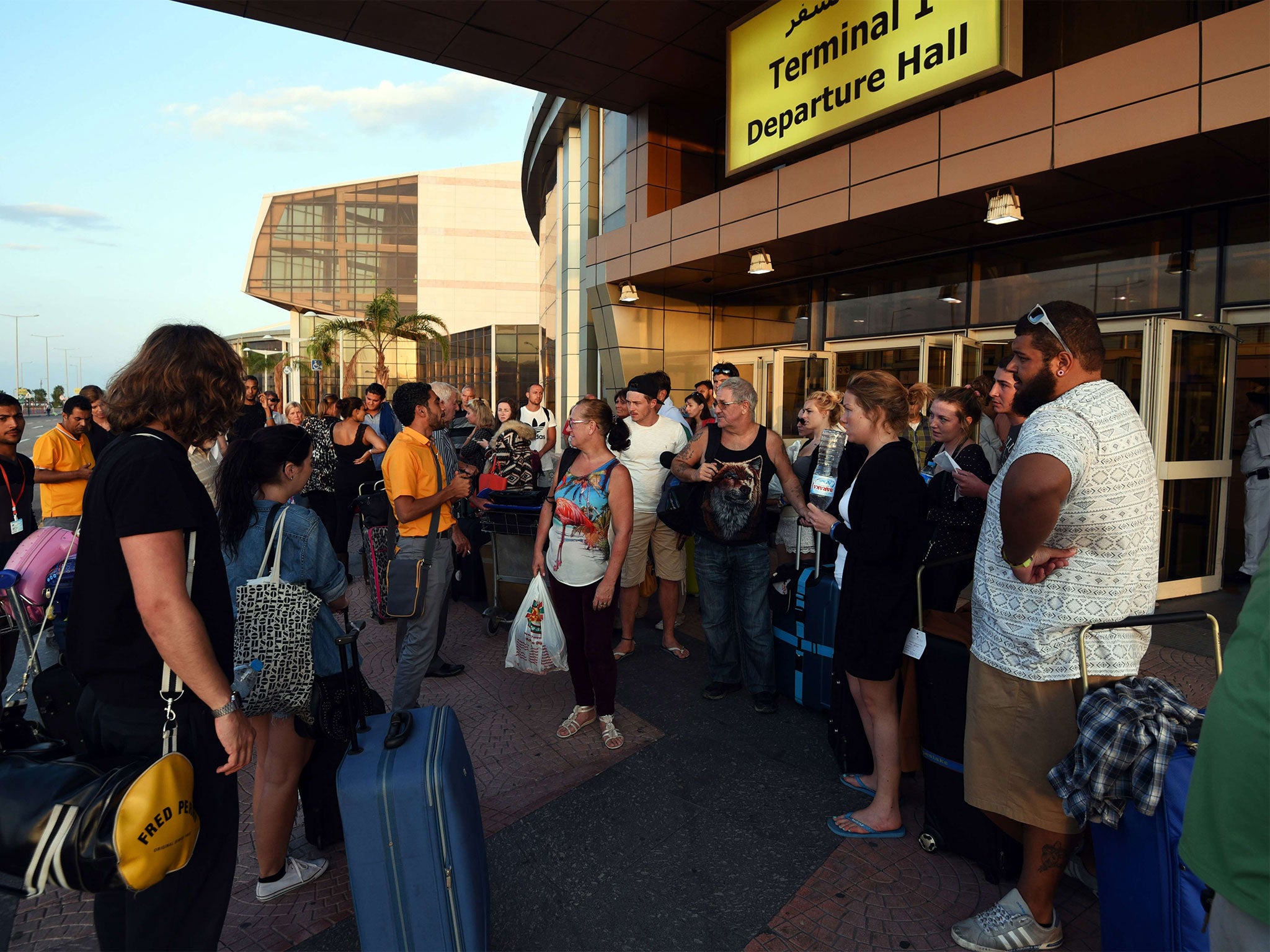 British tourists arrive at Sharm el-Sheikh airport hoping to get on flights home