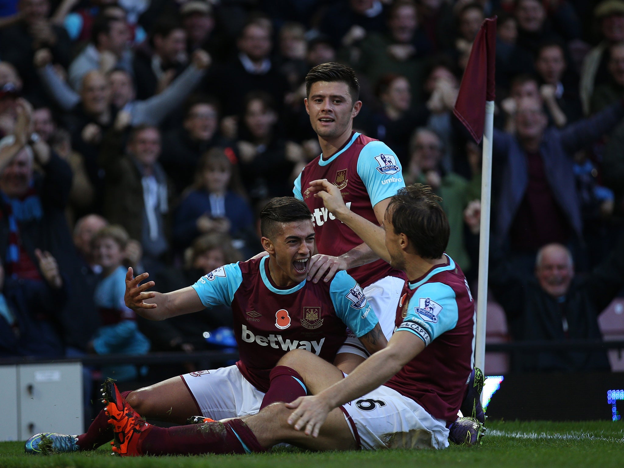 West Ham's players celebrate Manuel Lanzini's opener