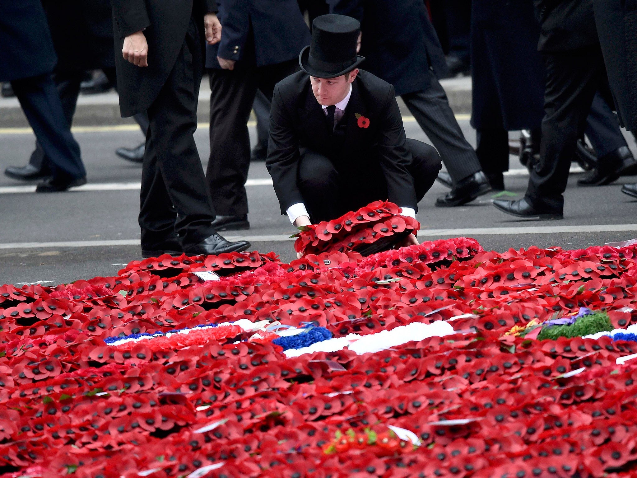 Poppy wreaths are laid during the Remembrance Sunday ceremony at the Cenotaph in Westminster Reuters