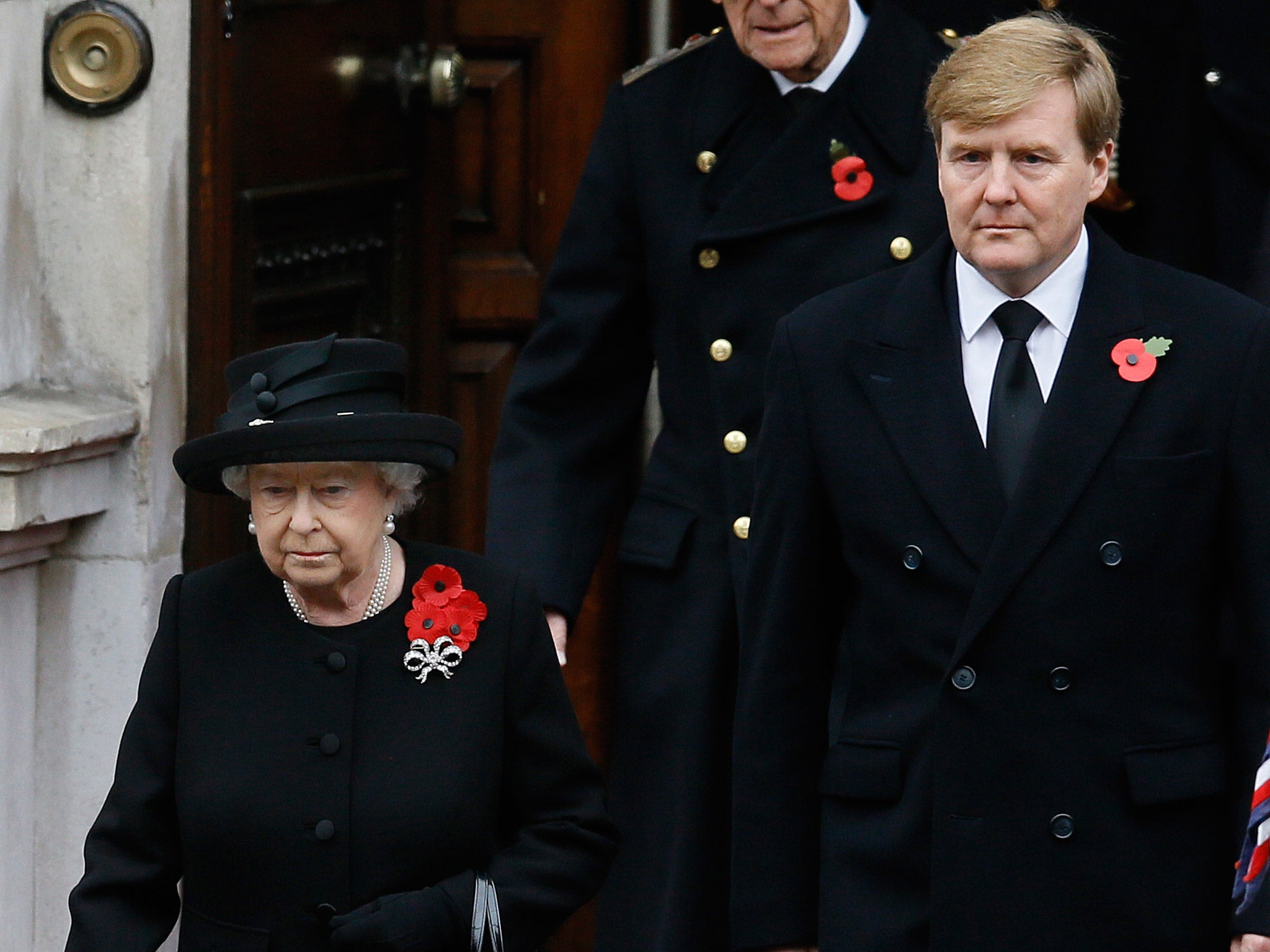 King Willem-Alexander of the Netherlands and Queen Elizabeth II arrive to attend the service in London AP