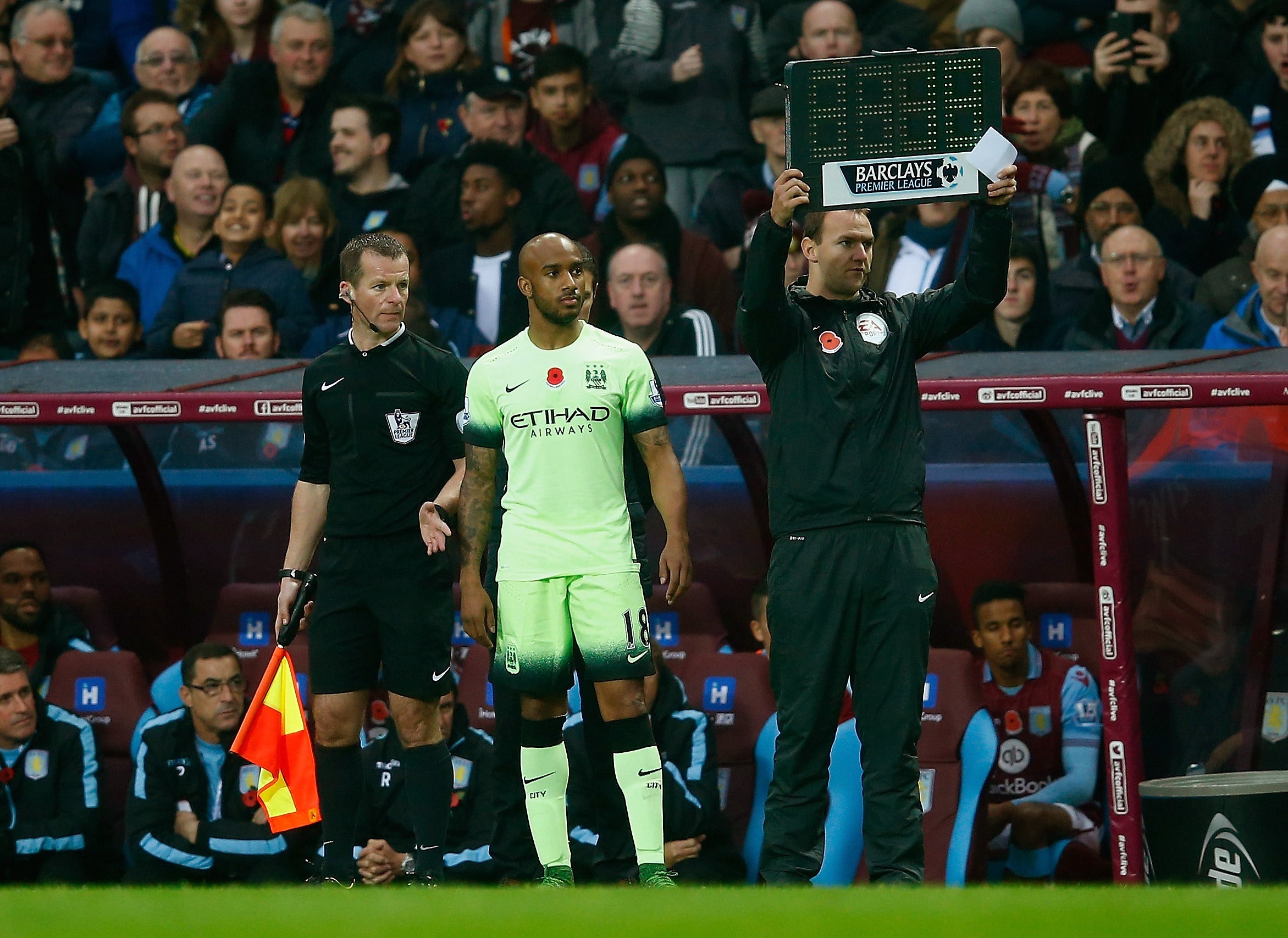 Fabian Delph enters the action, amid boos from the Aston Villa fans